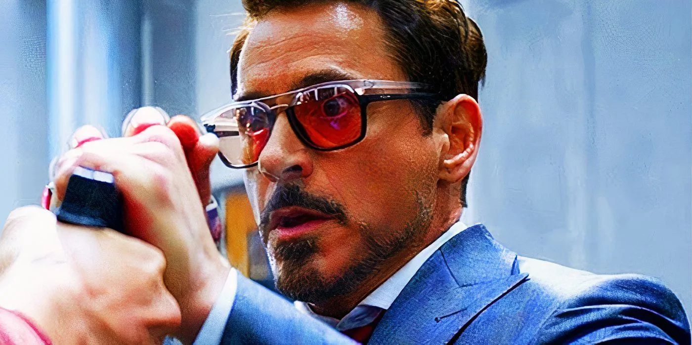 Tony Stark zatrzymuje kulę ręką Iron Mana w filmie Kapitan Ameryka: Wojna bohaterów