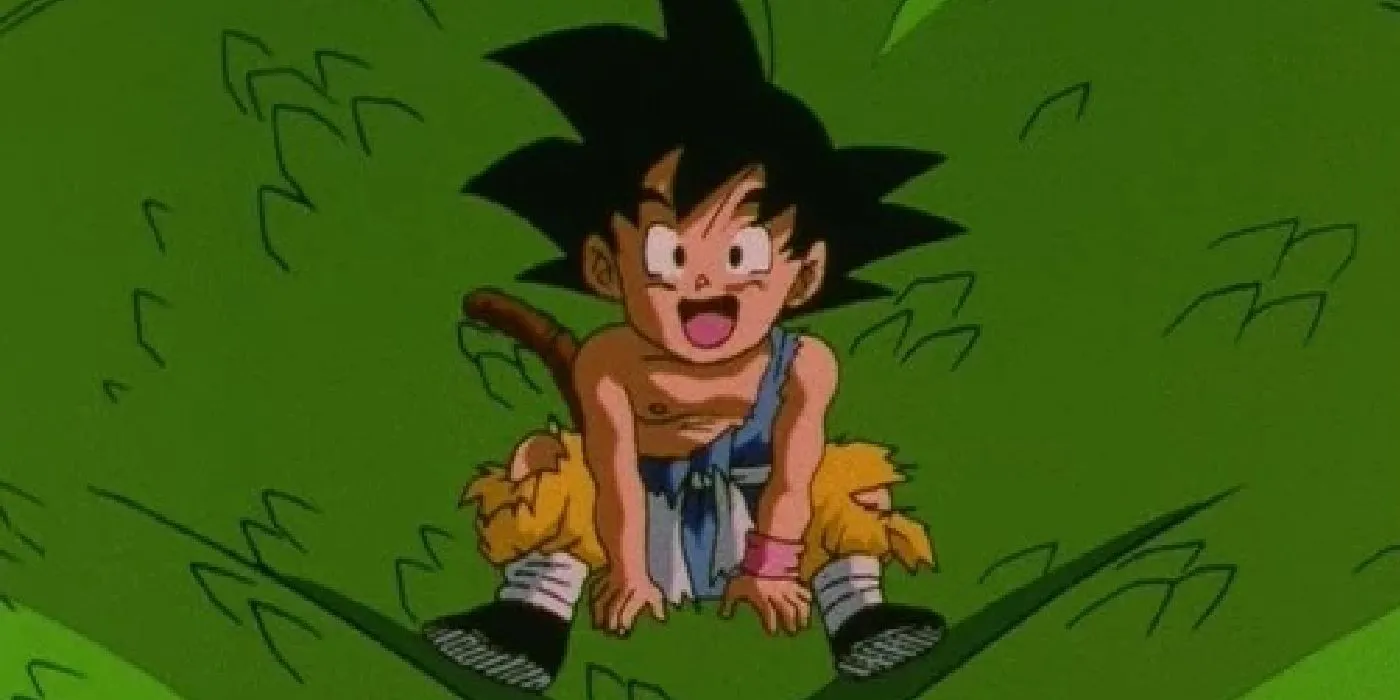 Kid Goku lächelt, als er in der letzten Folge von Dragon Ball GT auf Shenrons Kopf reitet.