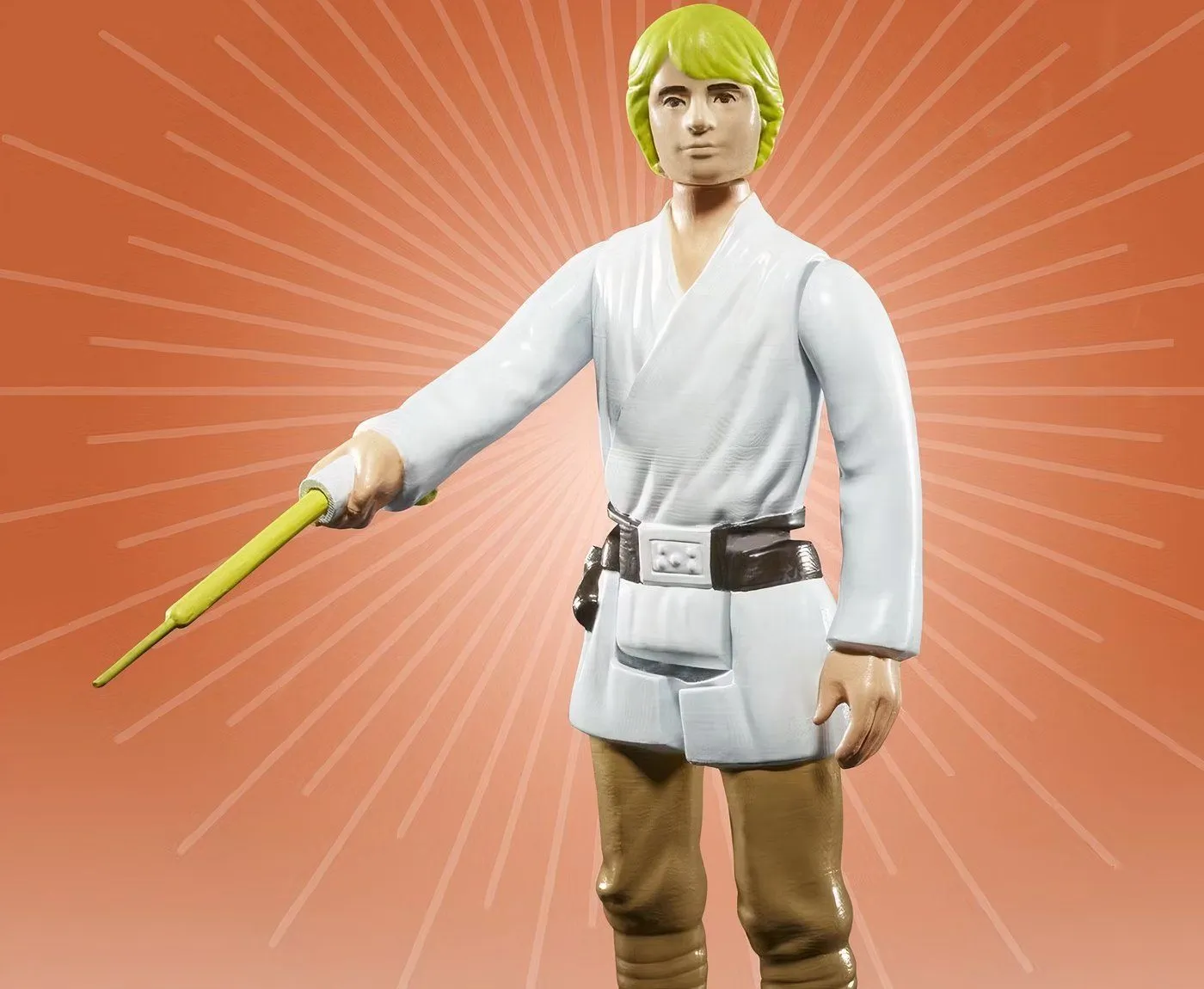 Star Wars Kenner Toys action figure Luke Skywalker with a yellow lightsaber.