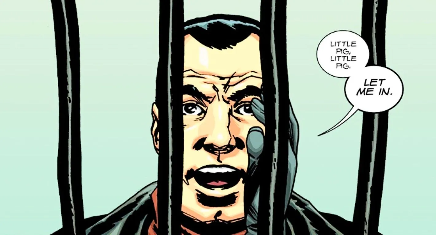 Walking Dead Deluxe #103, Negan dice 'cerdito, cerdito, déjame entrar' a través de barrotes de hierro