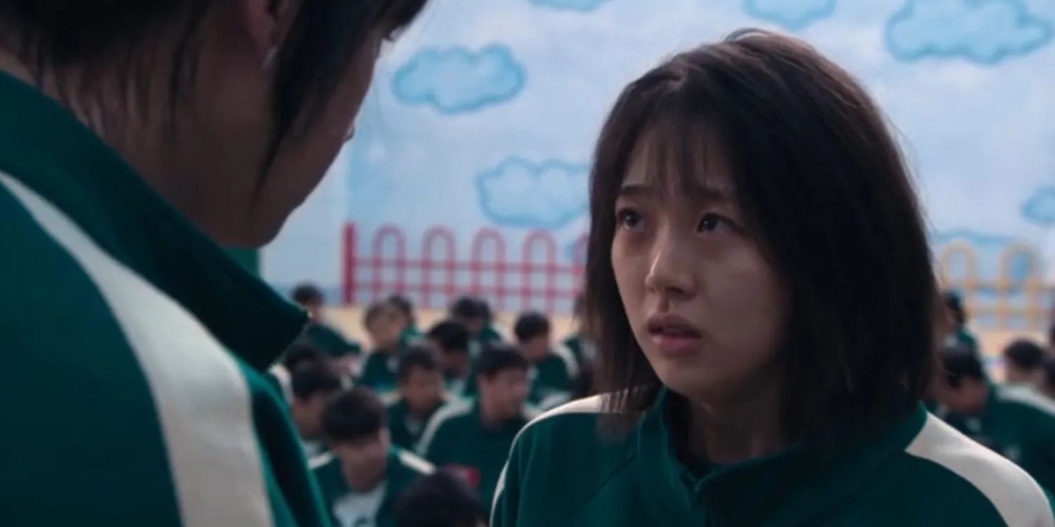 Young-mi looking scared while Hyun-ju gives her courage in Squid Game season 2