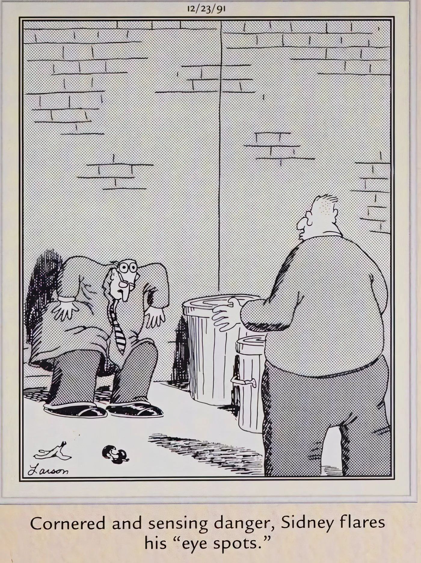 A man showing another man a pair of fake eyes to scare him off in The Far Side. A man showing another man a pair of fake eyes to scare him off in The Far Side.