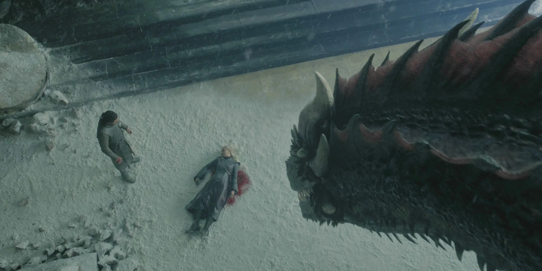 Drogon looking down at Jon Snow with Daenerys' body in the Game of Thrones series finale Drogon looking down at Jon Snow with Daenerys' body in the Game of Thrones series finale
