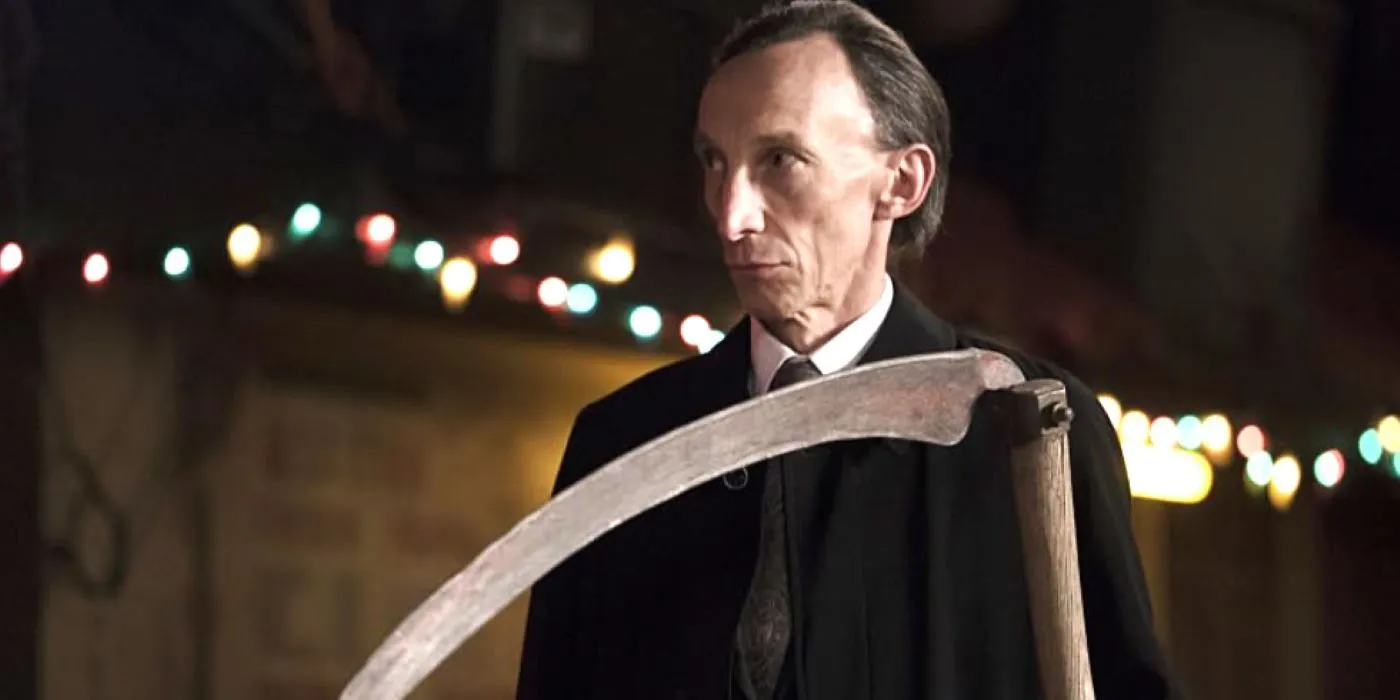 Julian Richings as Death holding a scythe. Julian Richings as Death holding a scythe.