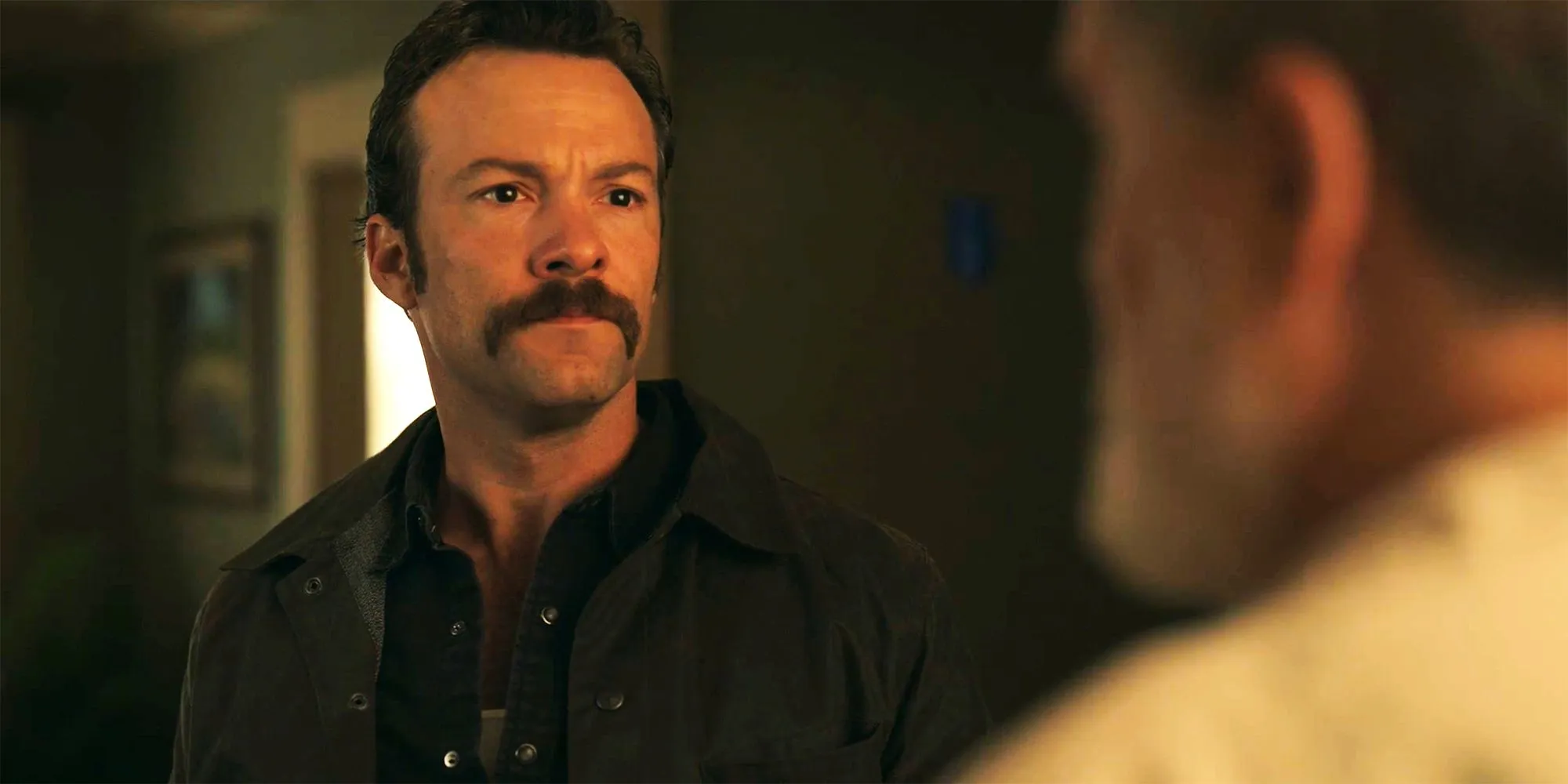 Kyle Schmid as Mike Franks looks upset in NCIS Origins Kyle Schmid as Mike Franks looks upset in NCIS Origins