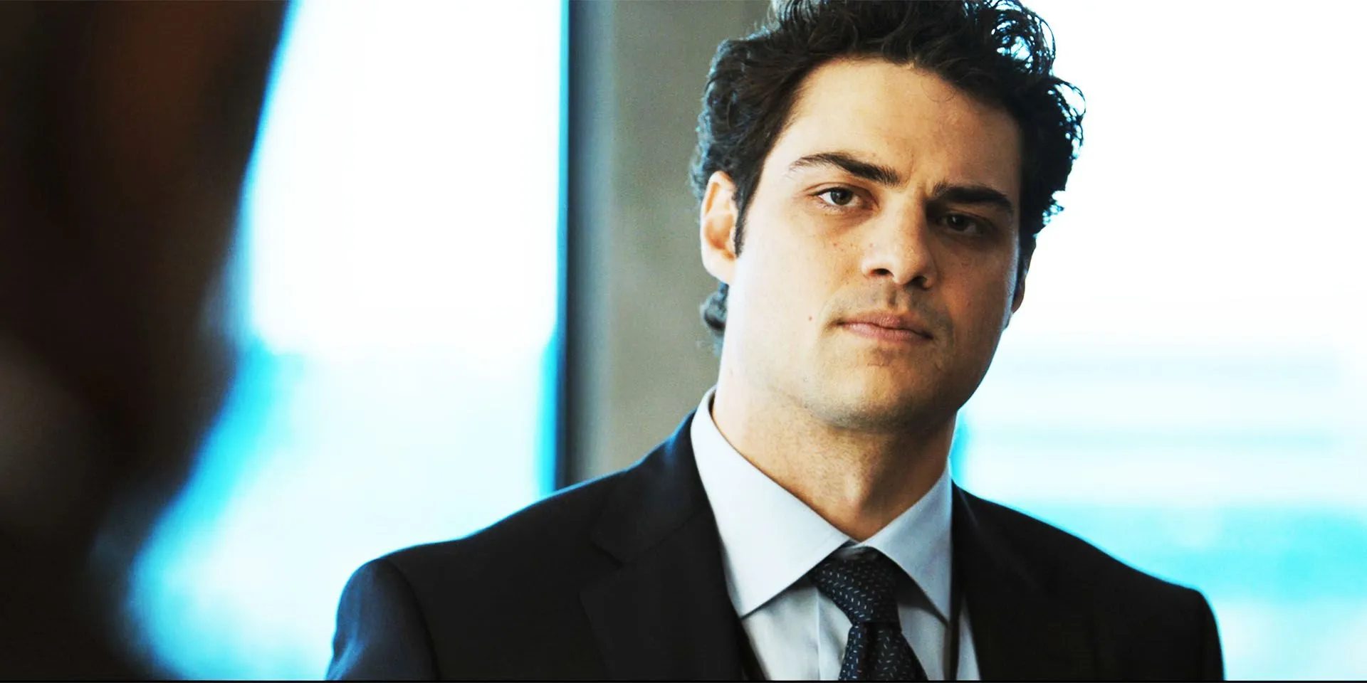 Noah Centineo as Owen in The Recruit season 2, talking to his boss Noah Centineo as Owen in The Recruit season 2, talking to his boss