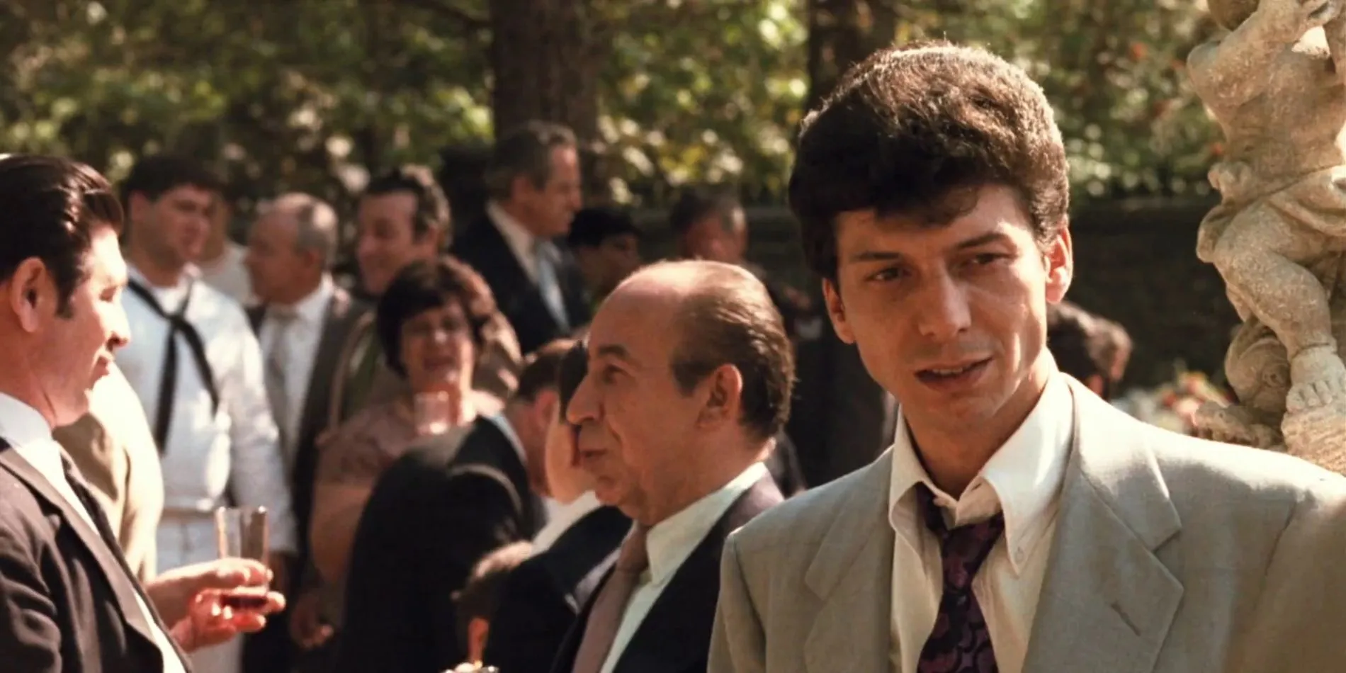 Paulie Gatto at a wedding in The Godfather. Paulie Gatto at a wedding in The Godfather.