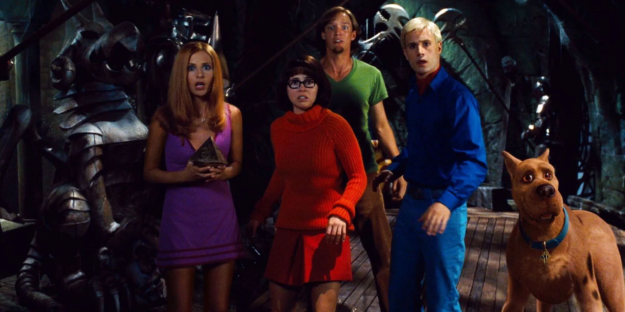 The cast of Scooby-Doo (2002) including Matthew Lillard, Sarah Michelle Gellar, Linda Cardellini, and Freddie Prinze Jr.