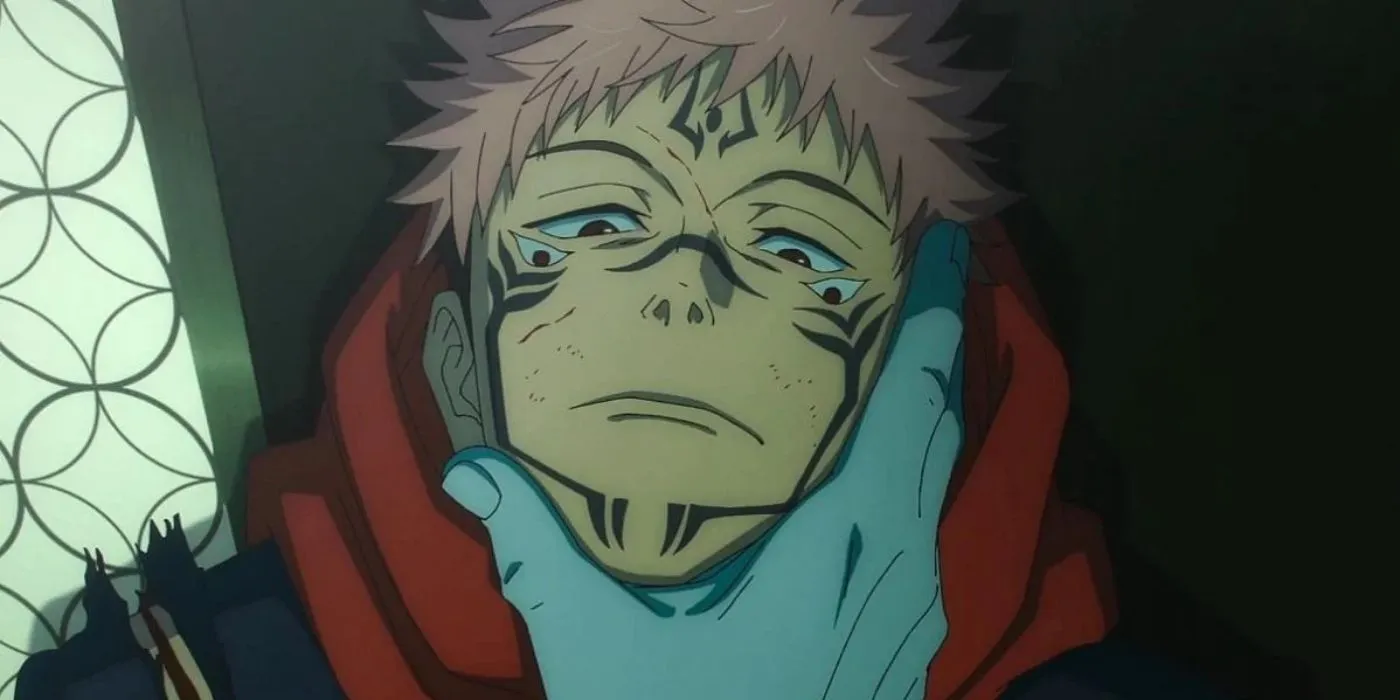 Sukuna Ryomen looking up in disappointment as Jogo holds his face.