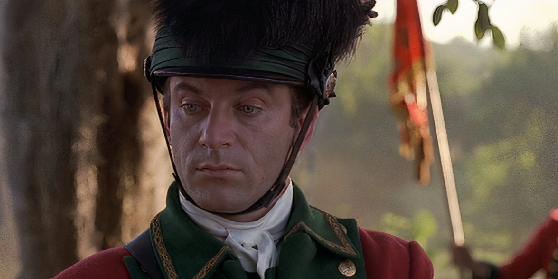 Jason Isaacs looking to one side as Col. William Tavington in The Patriot