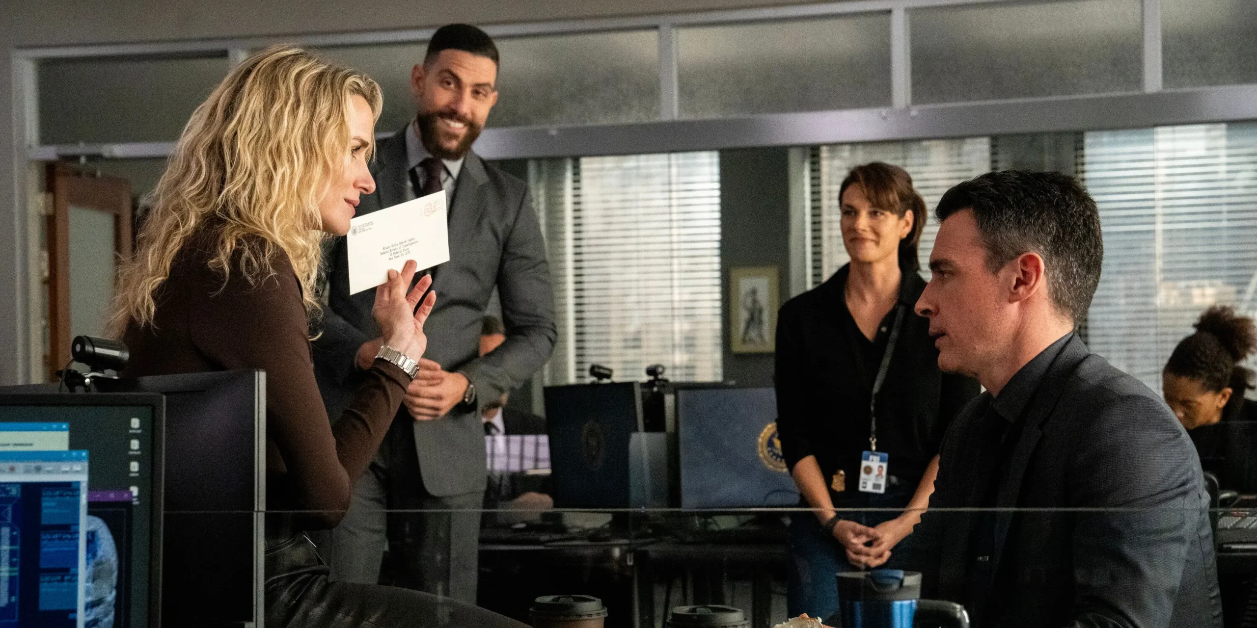 Nina Chase and FBI Team. Nina Chase and FBI Team.