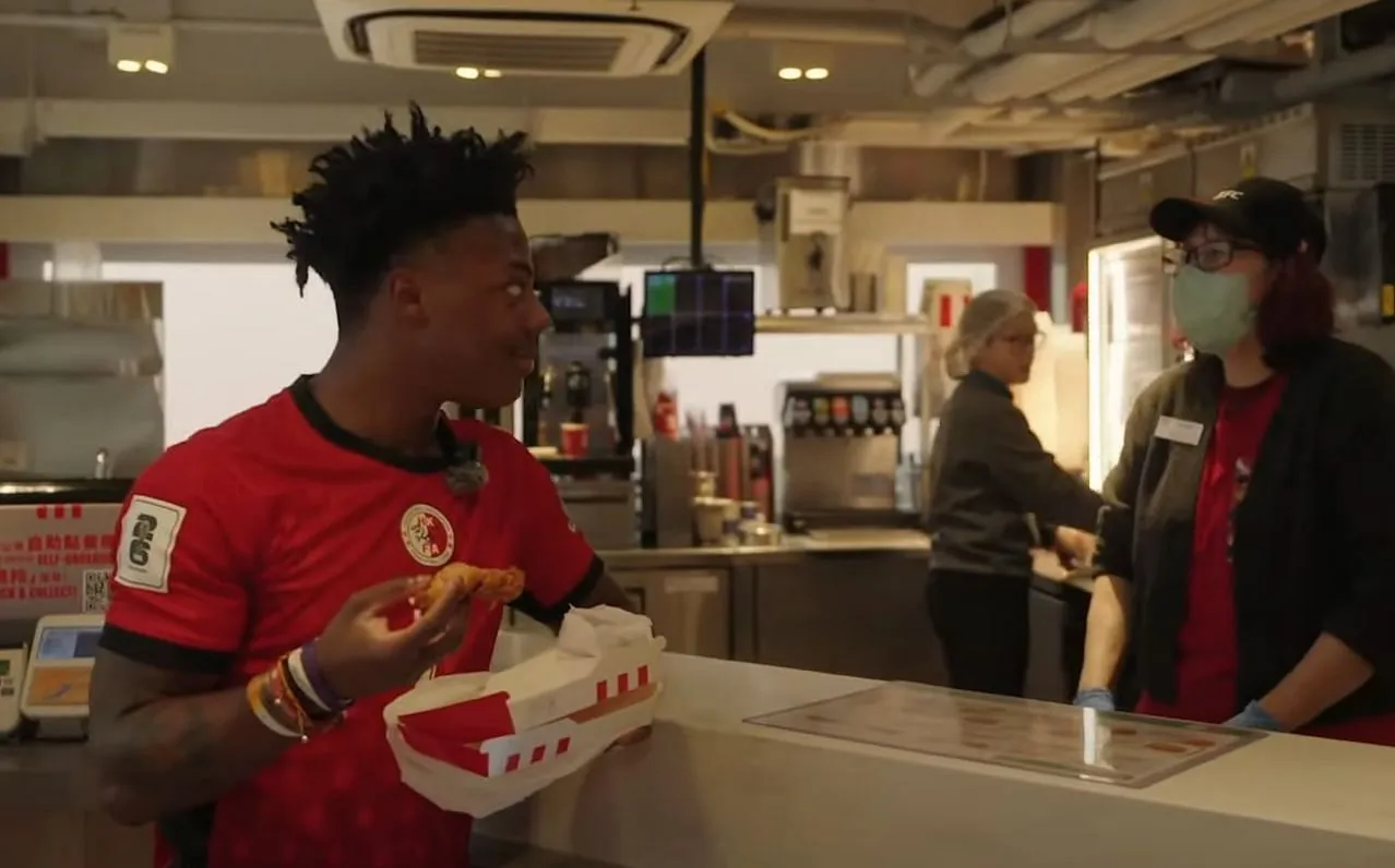 Speed prepares to experience Hong Kong's KFC Chicken (Image via IShowSpeed/YouTube)