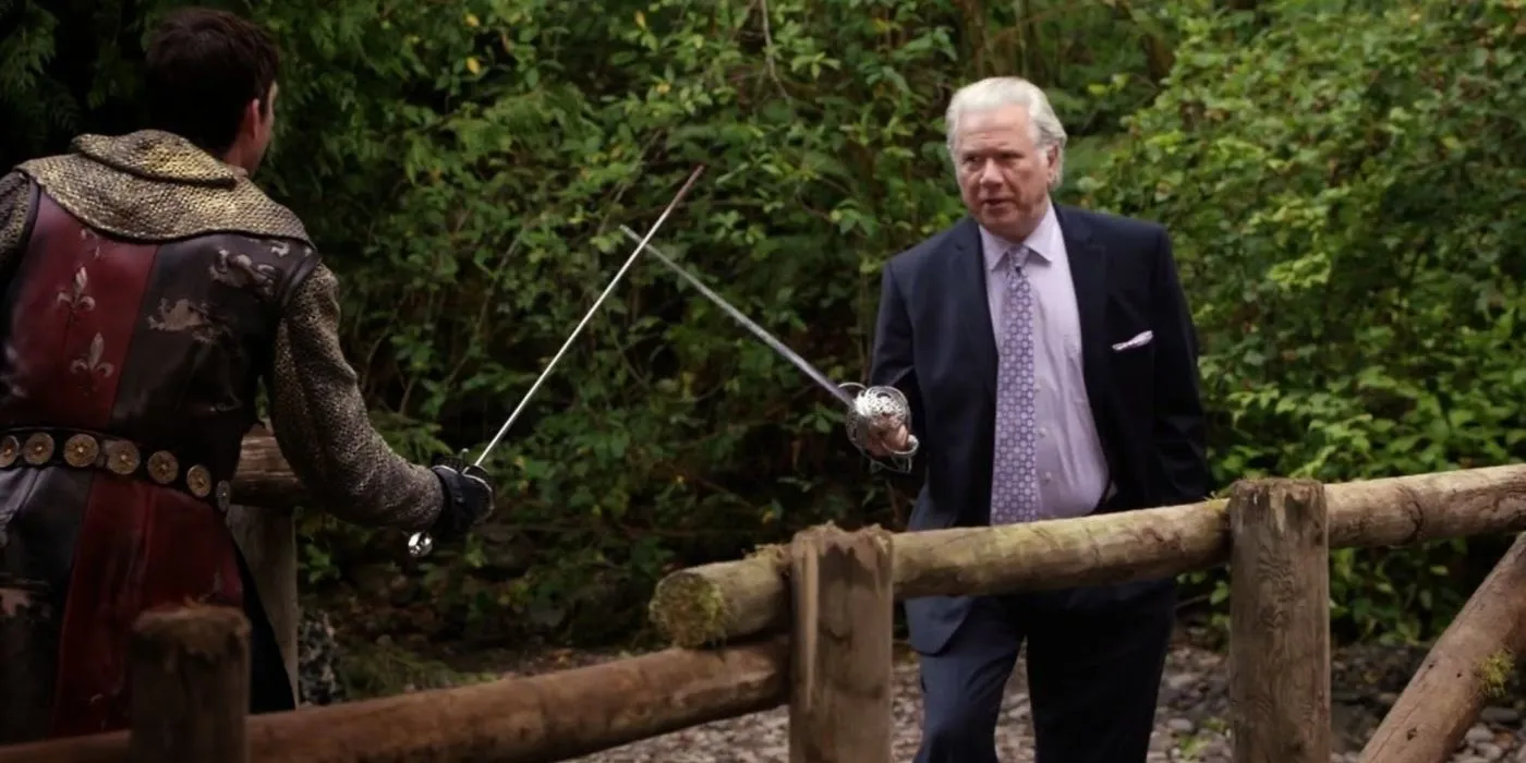 Jenkins (John Larroquette) parries a sword against Sir Galahad in The Librarians