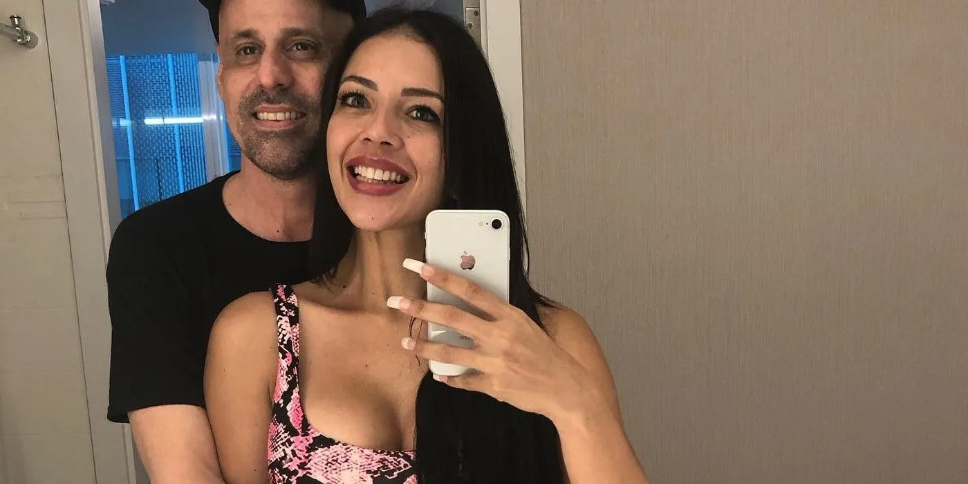 Gino and Jasmine taking mirror selfie Gino and Jasmine taking mirror selfie