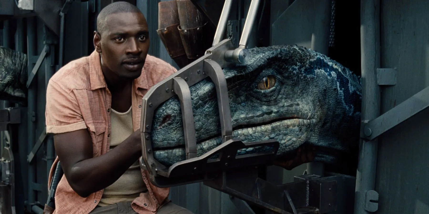 Barry Sembène taking care of Blue in Jurassic World