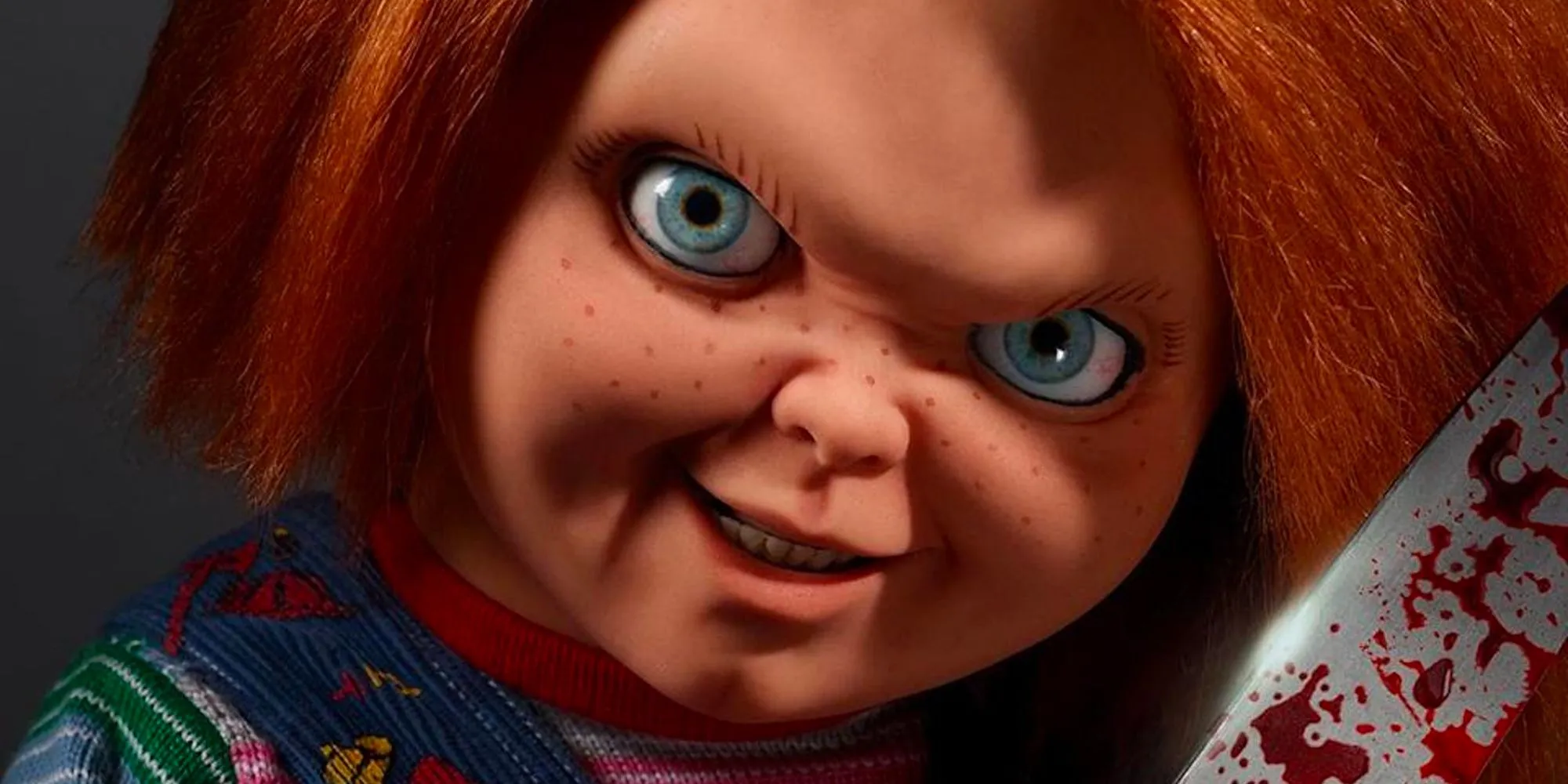 Chucky smiling with a sinister look Chucky smiling with a sinister look