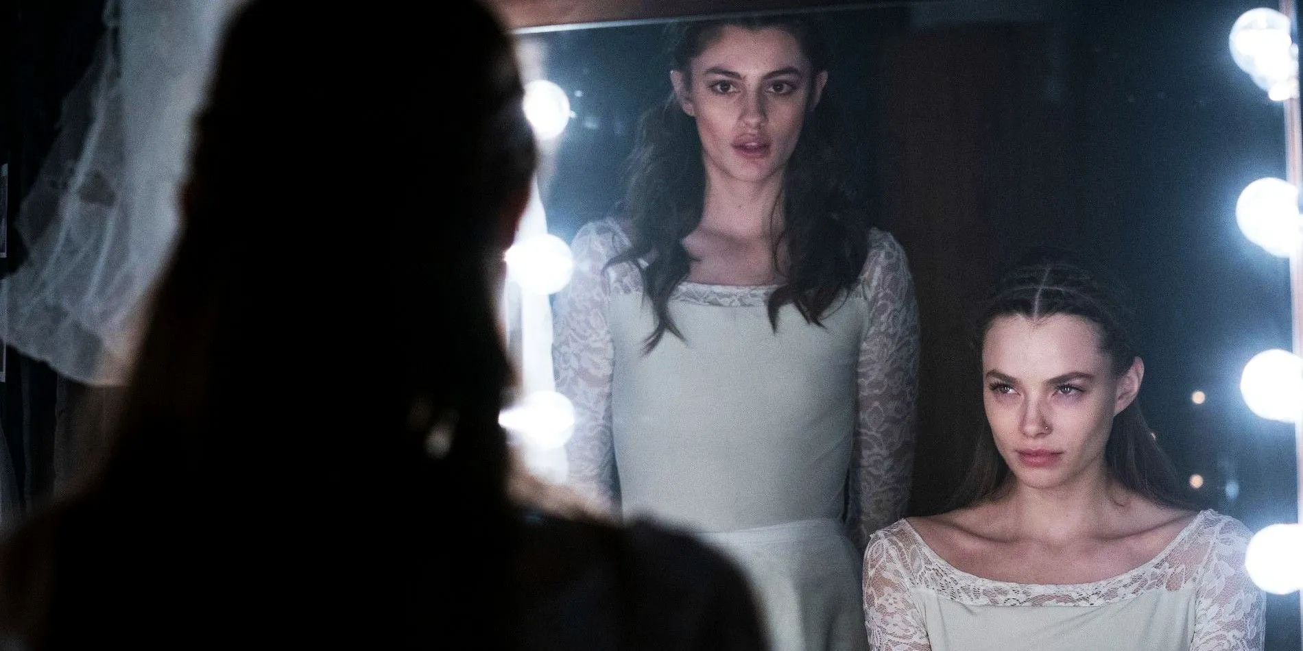 Diana Silvers as Kate and Christine Froseth as Marine Looking In The Mirror Birds of Paradise