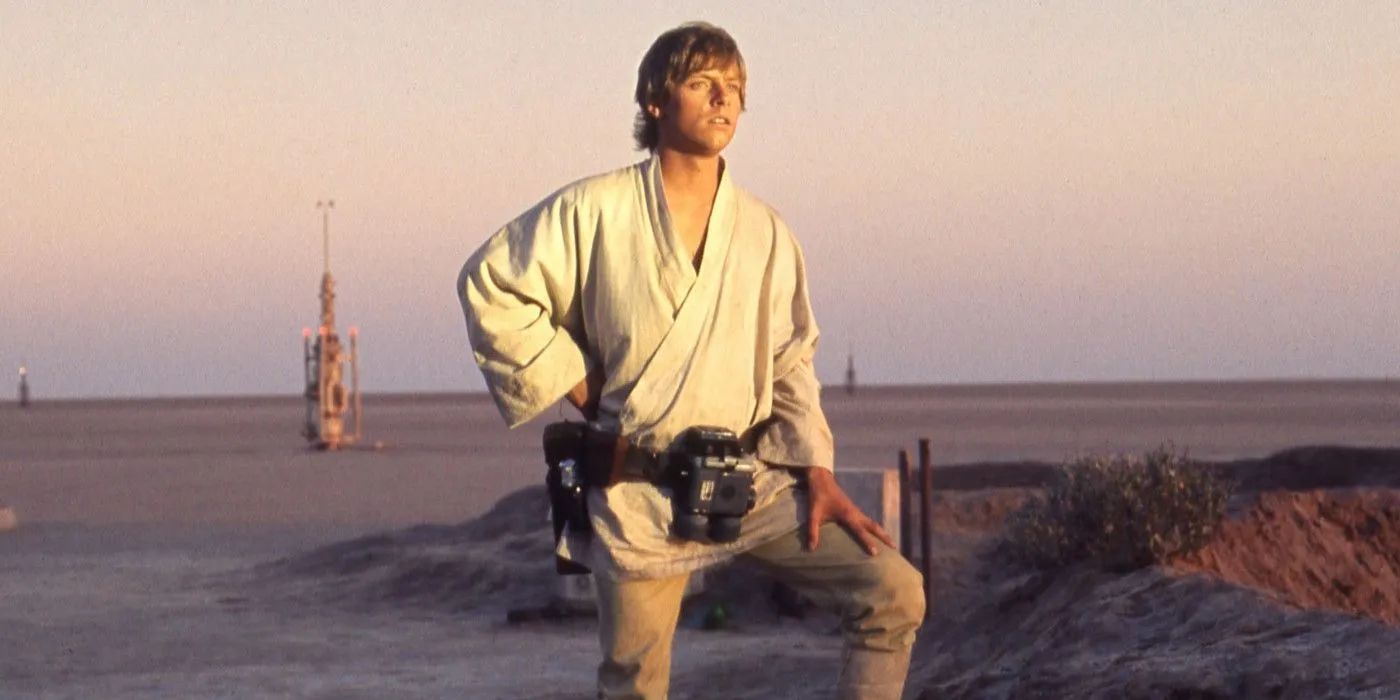 Luke Skywalker in Tatooine looking into the distance in Star Wars A New Hope.