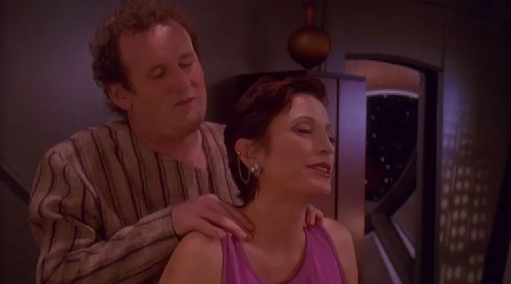 Chief O'Brien (Colm Meaney) gives Major Kira (Nana Visitor) a shoulder rub in Star Trek: Deep Space Nine Chief O'Brien (Colm Meaney) gives Major Kira (Nana Visitor) a shoulder rub in Star Trek: Deep Space Nine