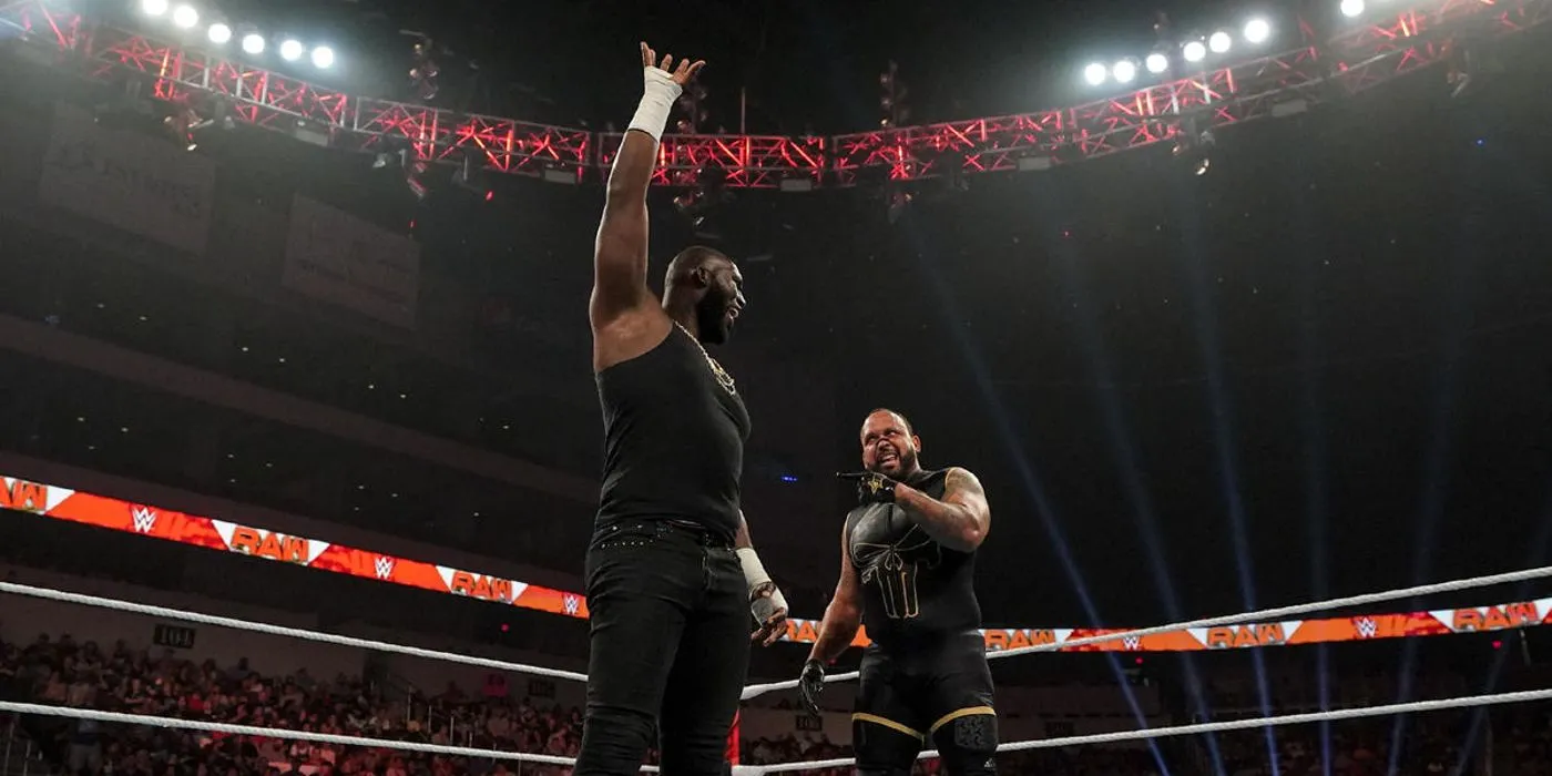 Omos raises his hand over MVP during a promo on Monday Night Raw Omos raises his hand over MVP during a promo on Monday Night Raw
