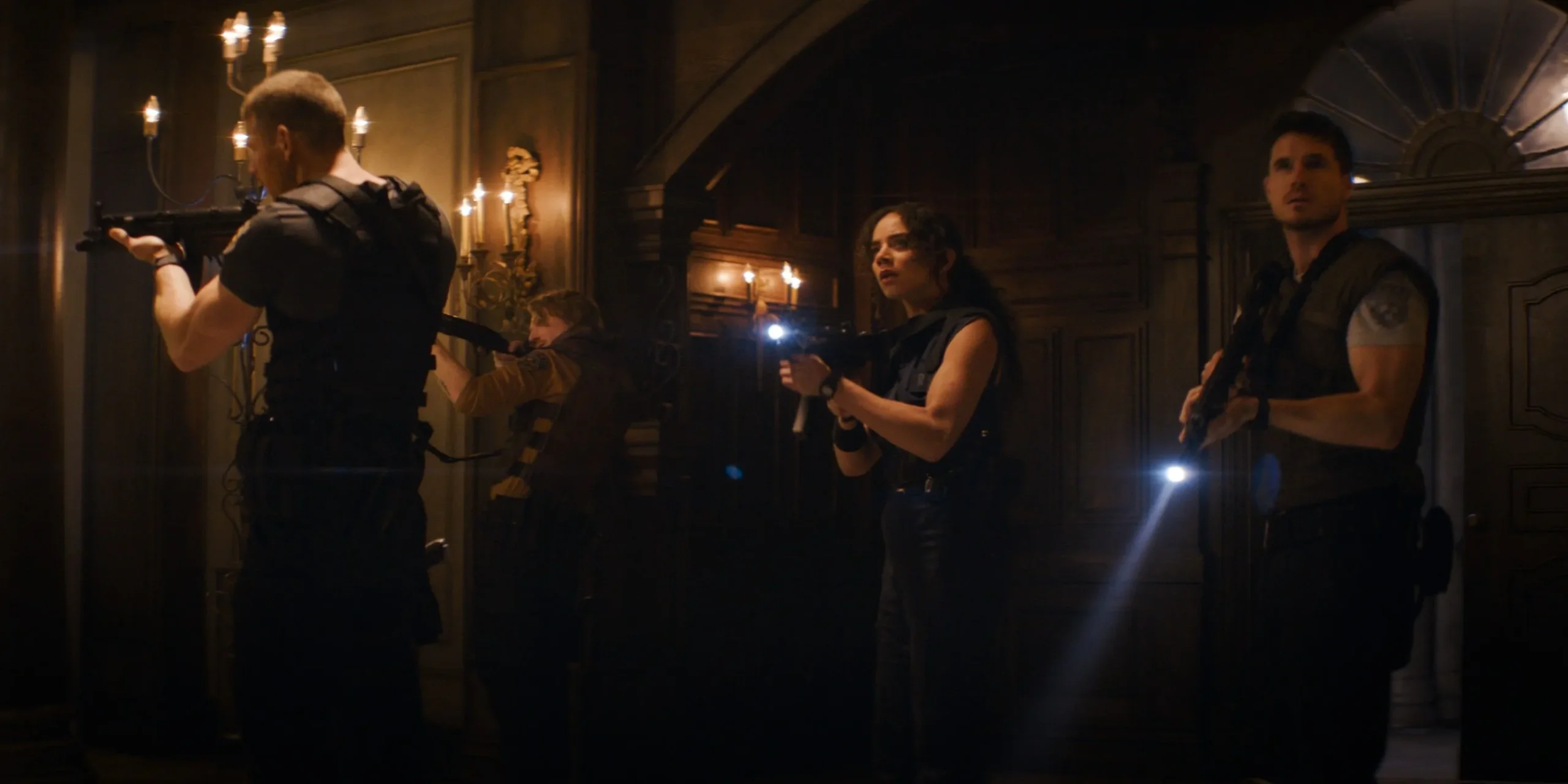 Cast of Resident Evil: Welcome to Raccoon City in action