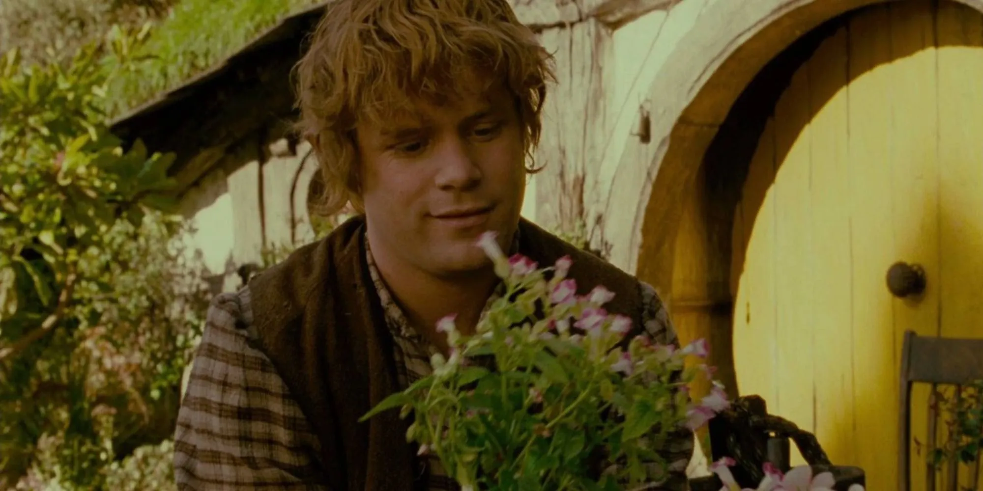 Sam planting flowers