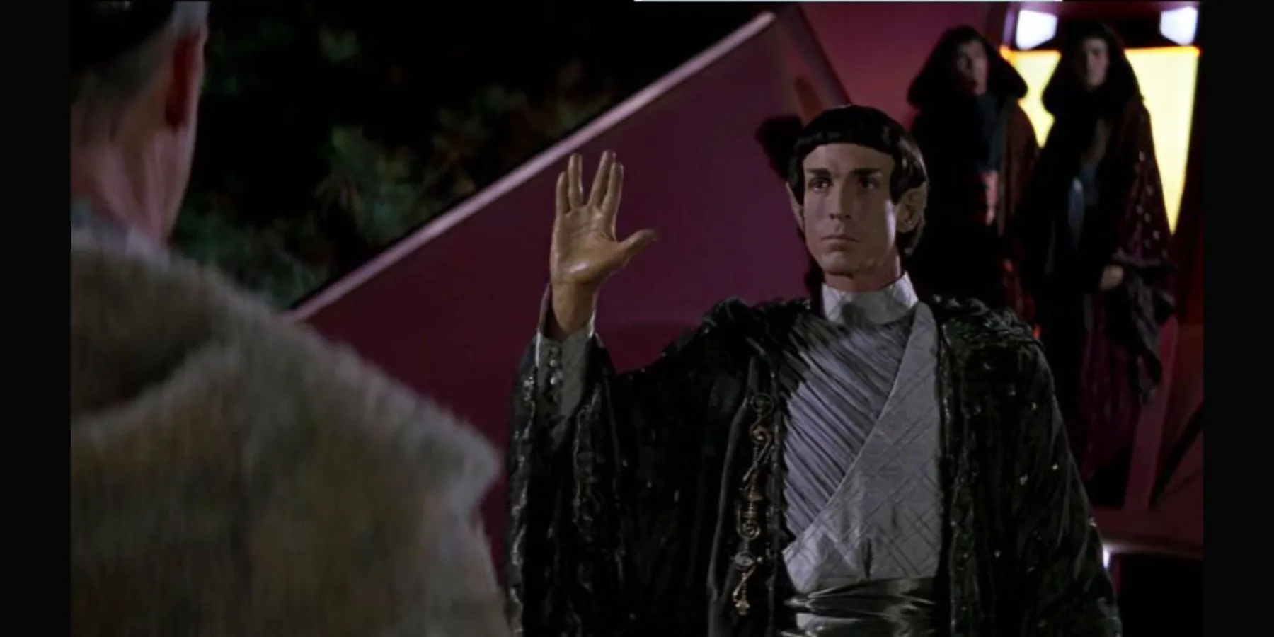 A Vulcan performing the Vulcan salute in Star Trek A Vulcan performing the Vulcan salute in Star Trek