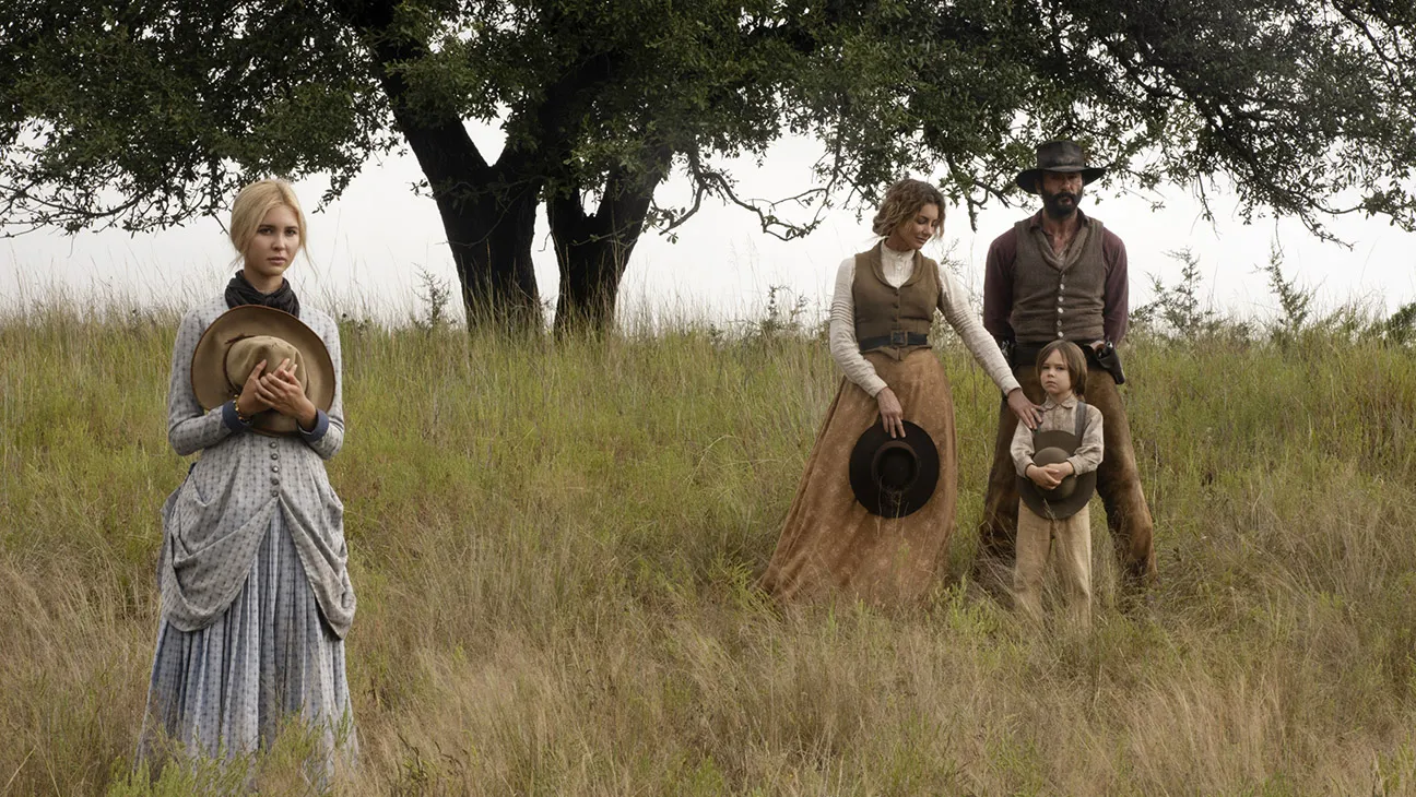 Elsa with her family in 1883: Faith Hill as Margaret, Tim McGraw as James and Audie Rick as young John Sr.