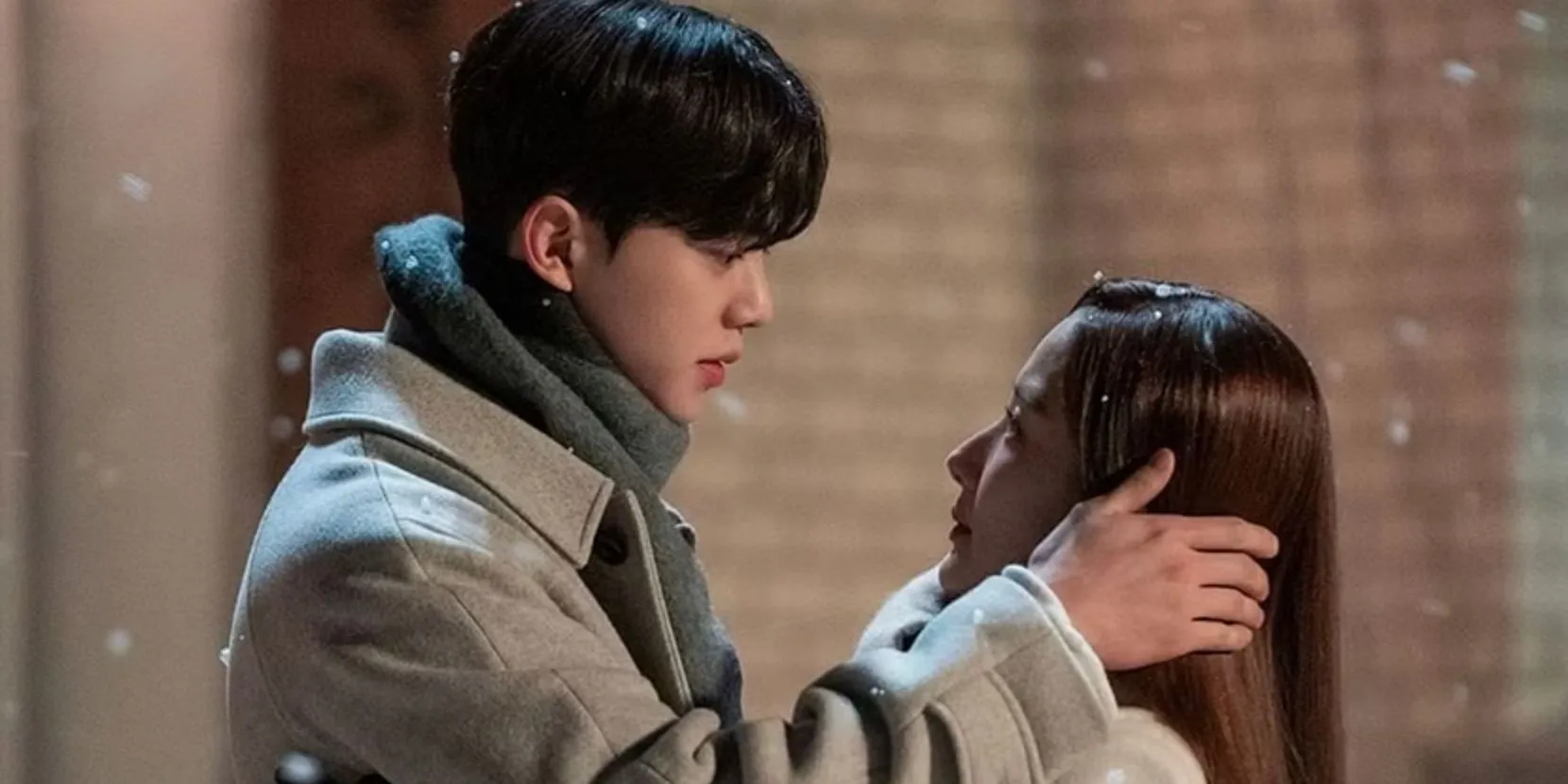Song Kang and Park Min-young embracing in the snow