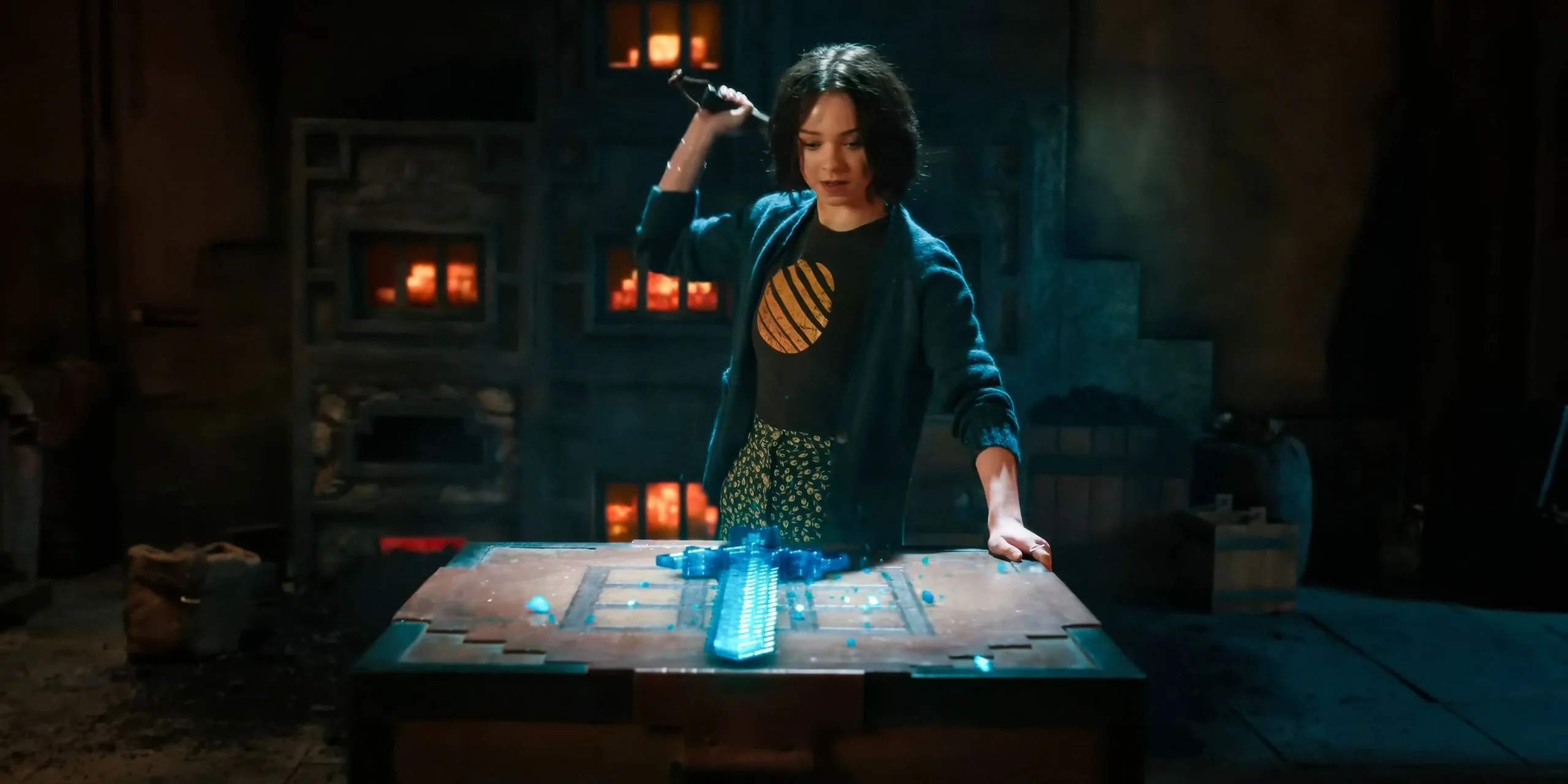 Emma Myers looks at her sword in A Minecraft Movie Emma Myers looks at her sword in A Minecraft Movie