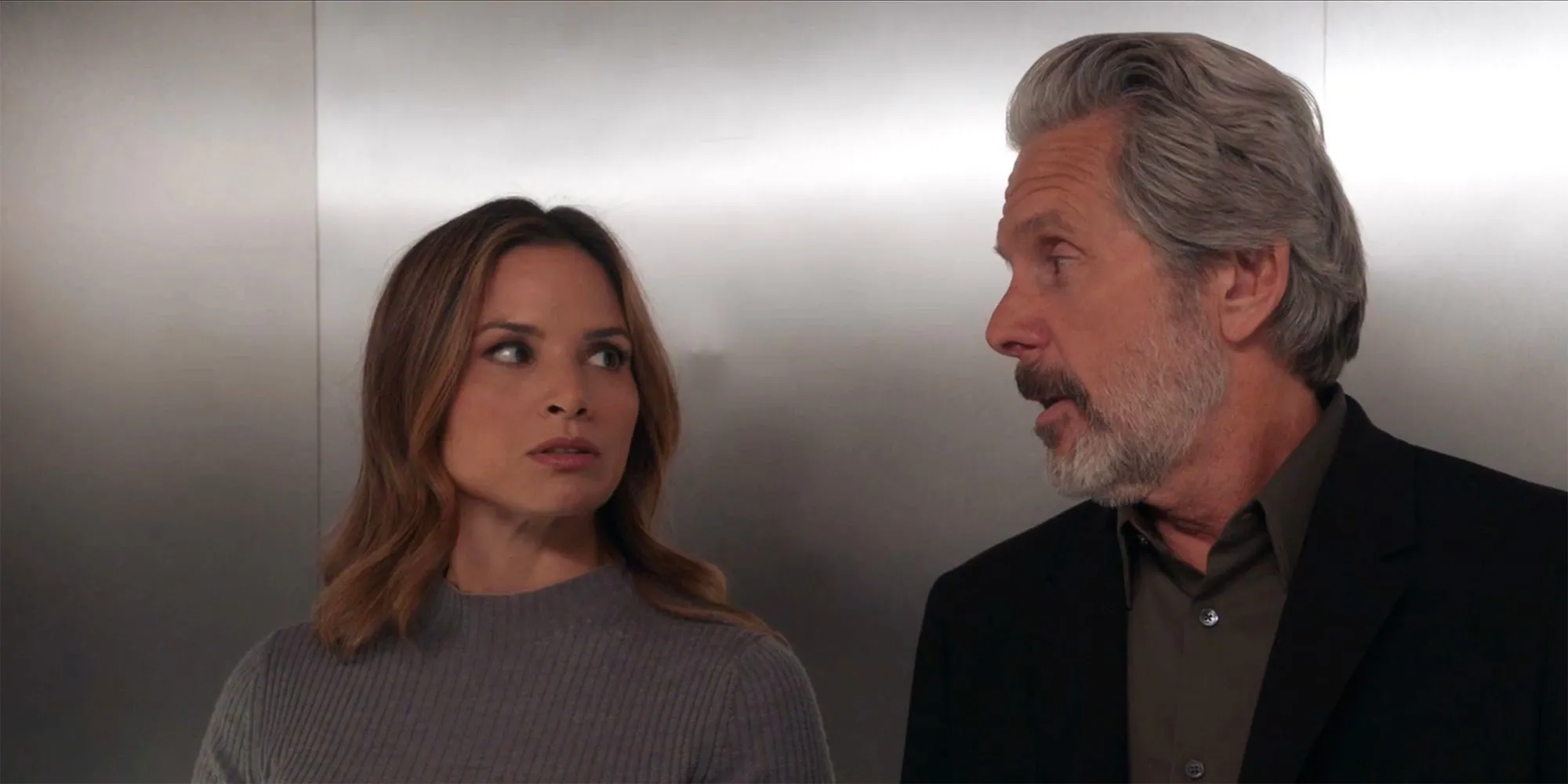 Agent Parker regards Knight in the elevator in NCIS season 22 Agent Parker regards Knight in the elevator in NCIS season 22