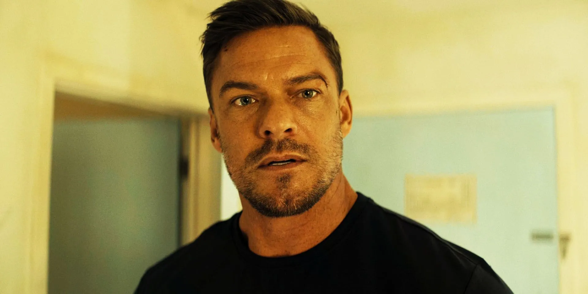 Alan Ritchson as Jack Reacher, looking shocked, in season 3 Alan Ritchson as Jack Reacher, looking shocked, in season 3