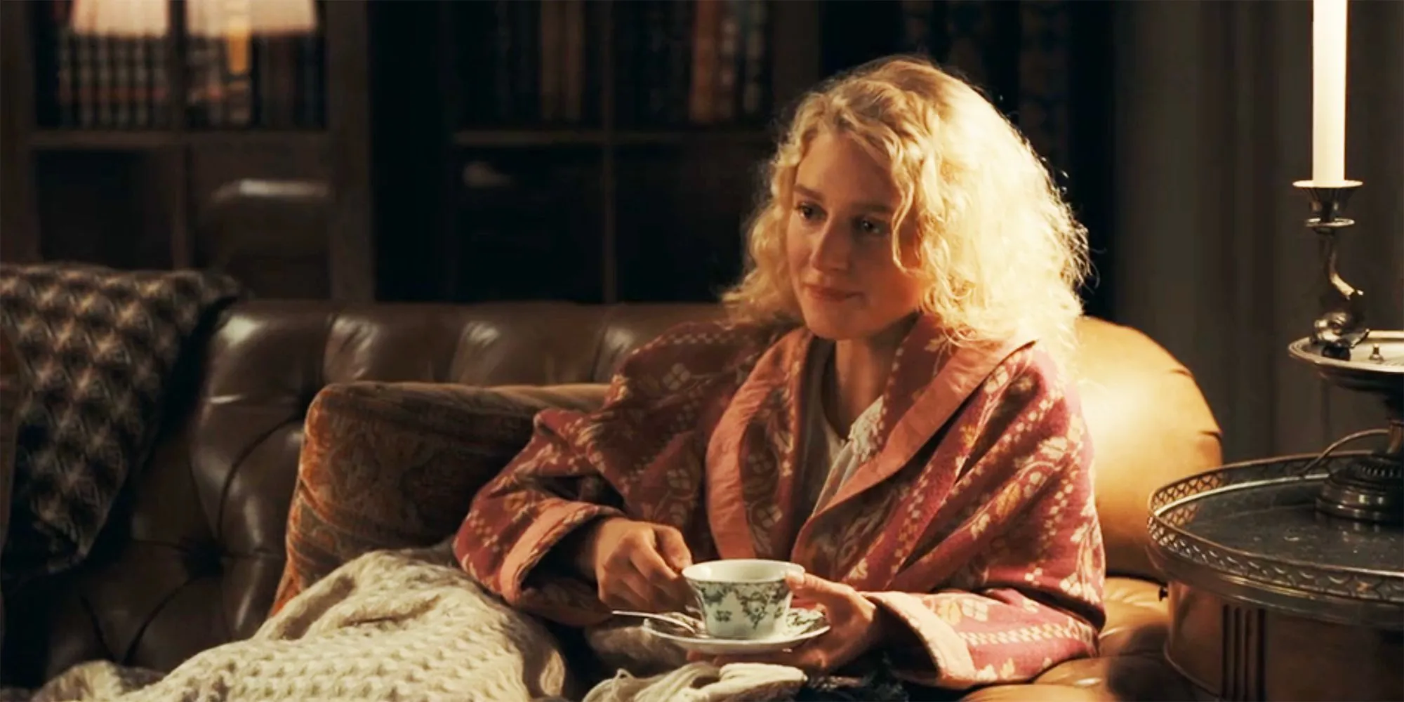Alex holding a cup of tea in 1923