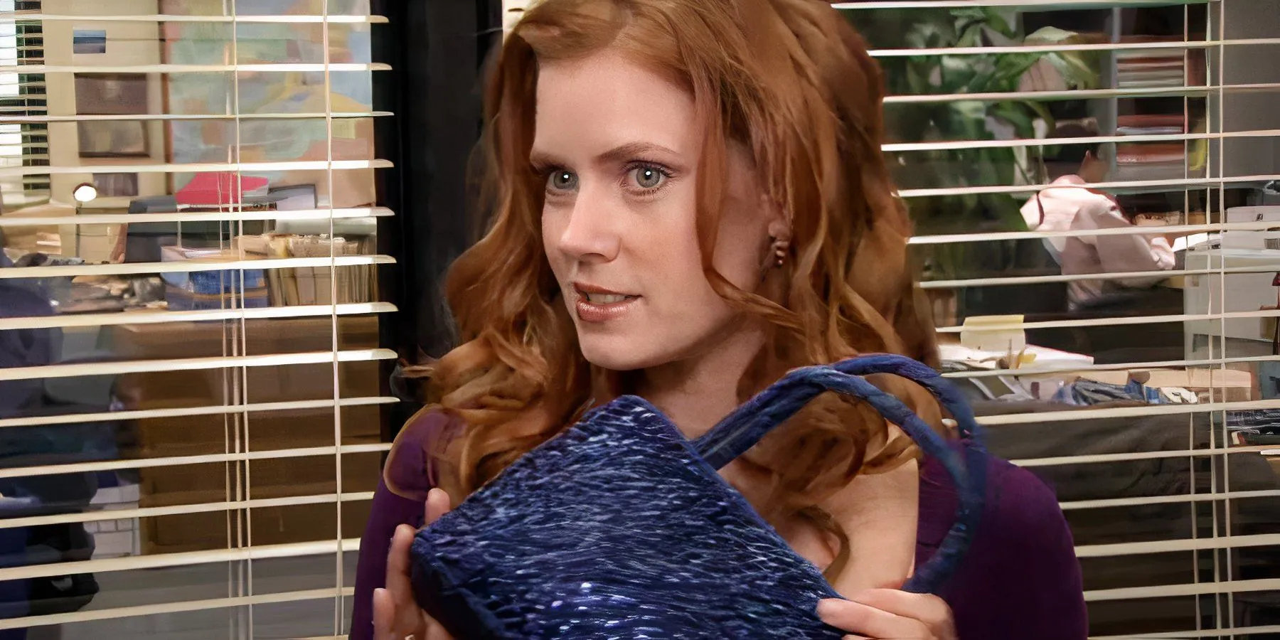 Amy Adams as Katy showing off a purse in The Office Amy Adams as Katy showing off a purse in The Office