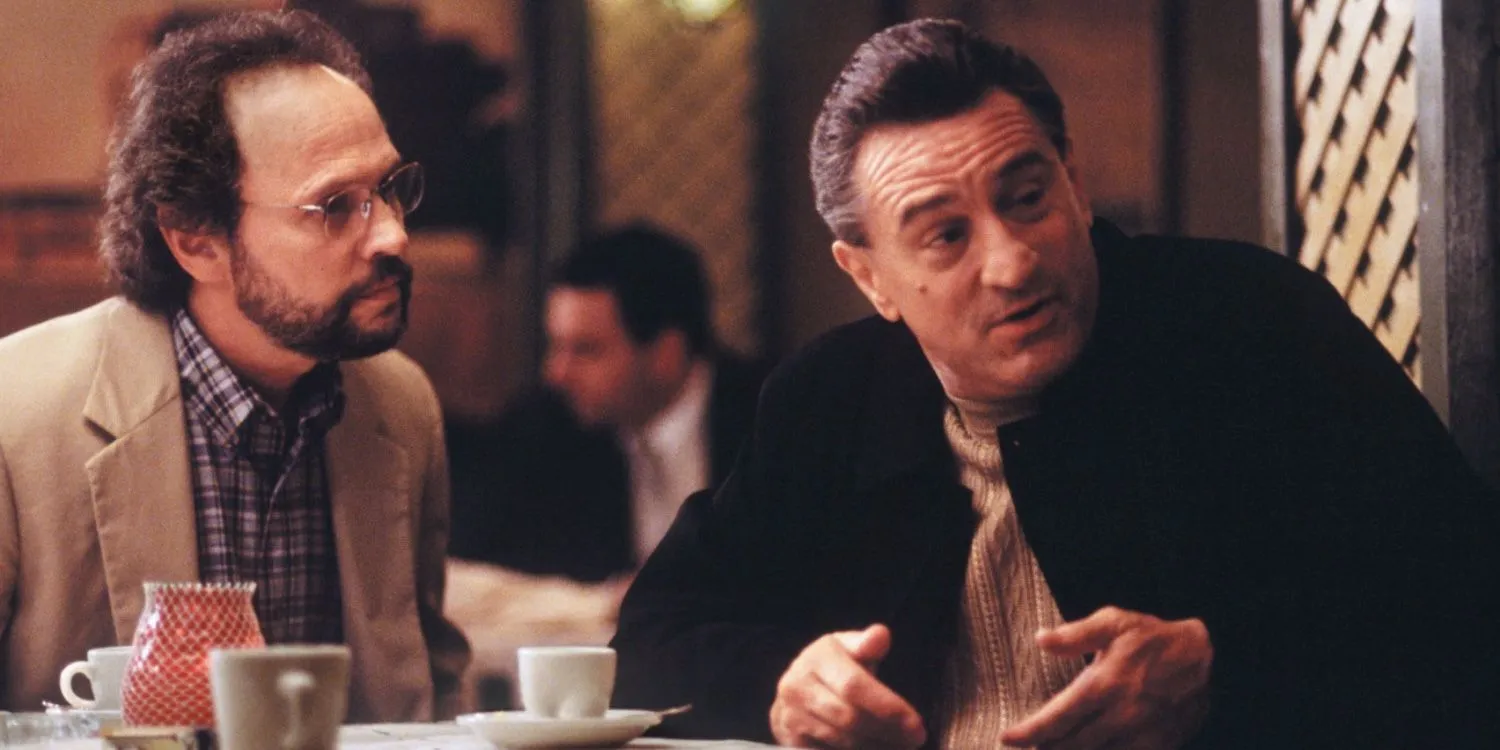 Billy Crystal and Robert De Niro sitting on a dining table in Analyze This Billy Crystal and Robert De Niro sitting on a dining table in Analyze This