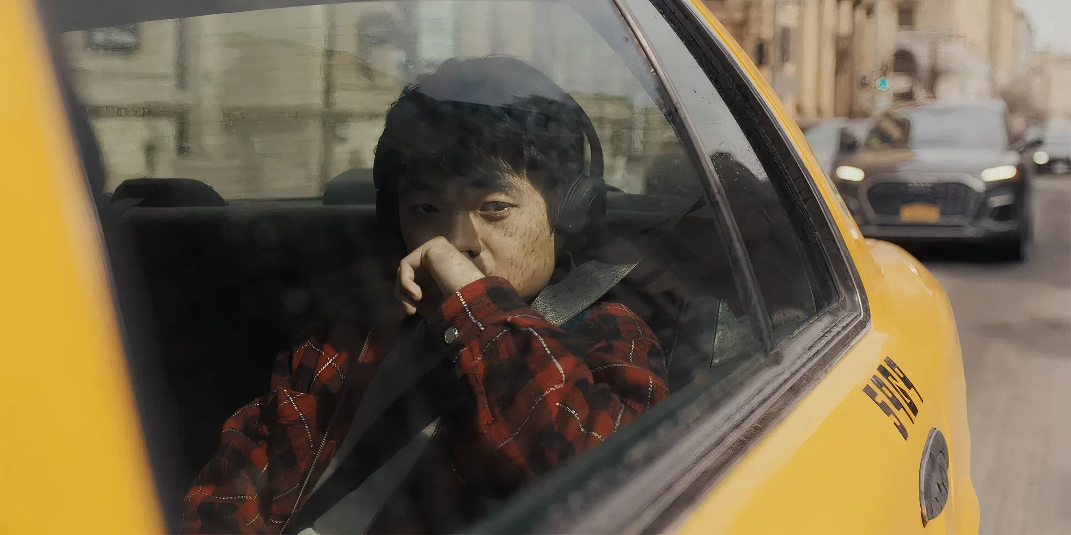 Li Fong in a taxi in Karate Kid: Legends Li Fong in a taxi in Karate Kid: Legends