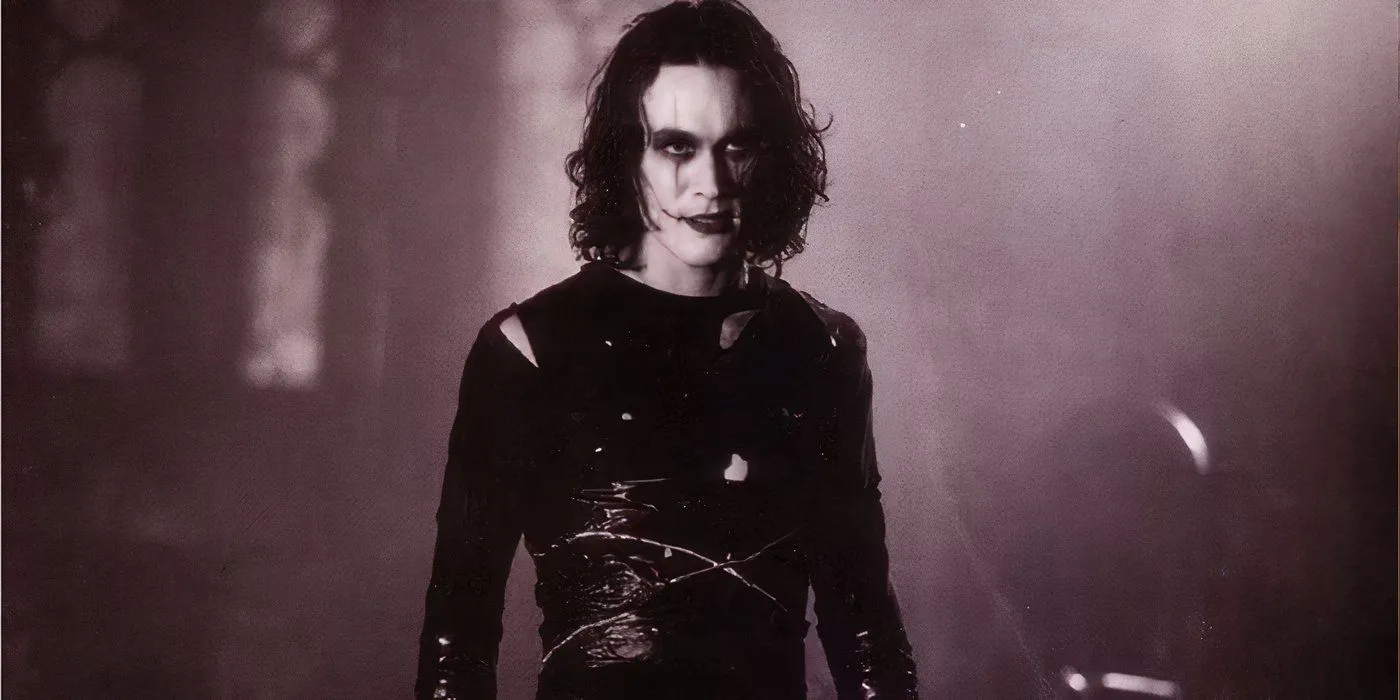 Brandon Lee in full makeup and dressed in black in The Crow