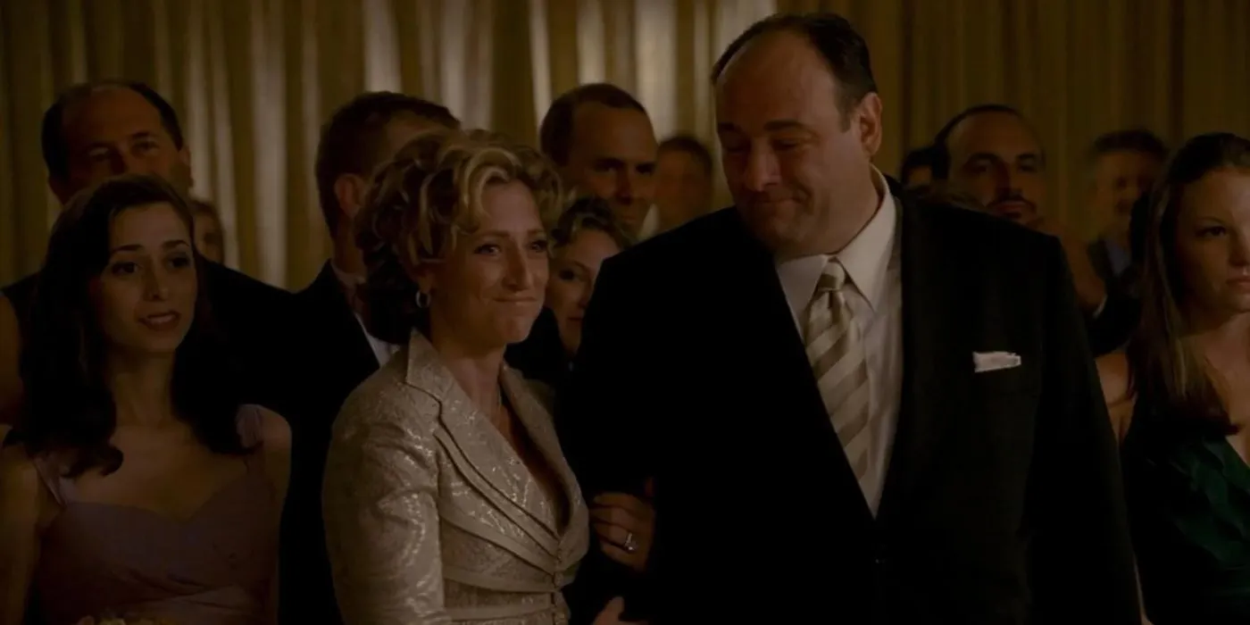 Catherine (Cristin Milioti), Carmen (Edie Falco), and Tony (James Gandolfini) smiling at a wedding together in The Sopranos.