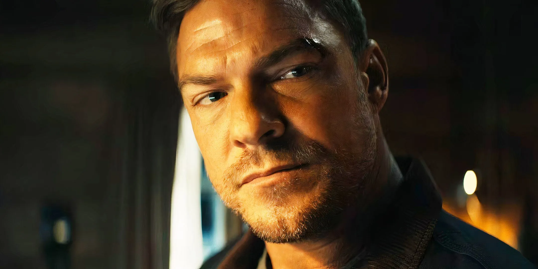 Close up of Alan Ritchson as Reacher Close up of Alan Ritchson as Reacher