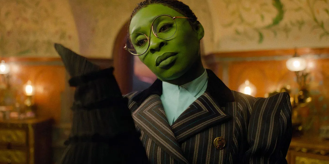 Cynthia Erivo as Elphaba holding her hat