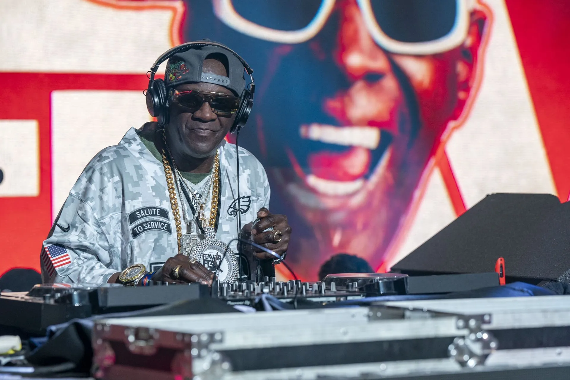 Hip-Hop artist and DI Flavor Flav performs at Guy Fieri's Flavortown Tailgate Party