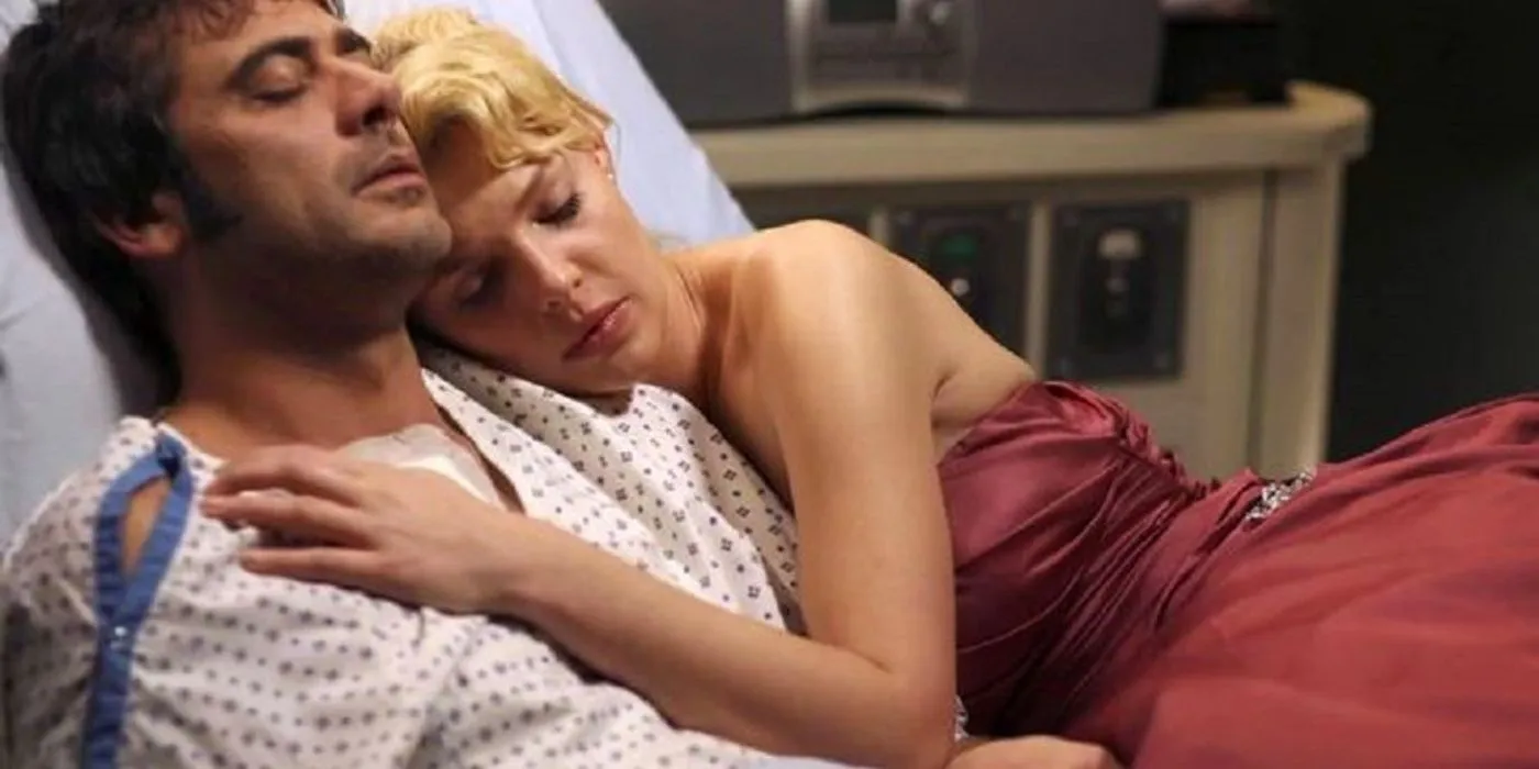 Denny and Izzie in hospital bed Denny and Izzie in hospital bed
