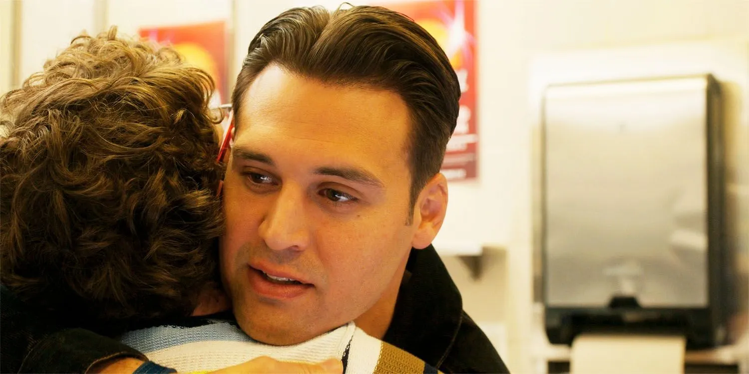 Eddie hugs Christopher