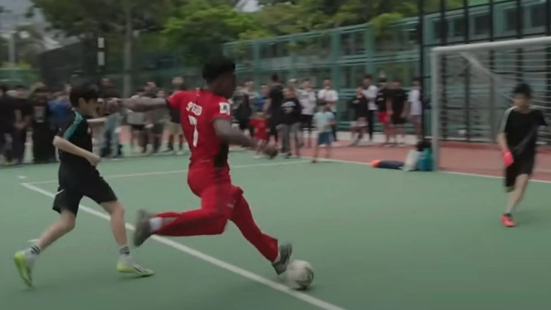 Speed scores a goal during a friendly match with fans (Image via IShowSpeed/YouTube)