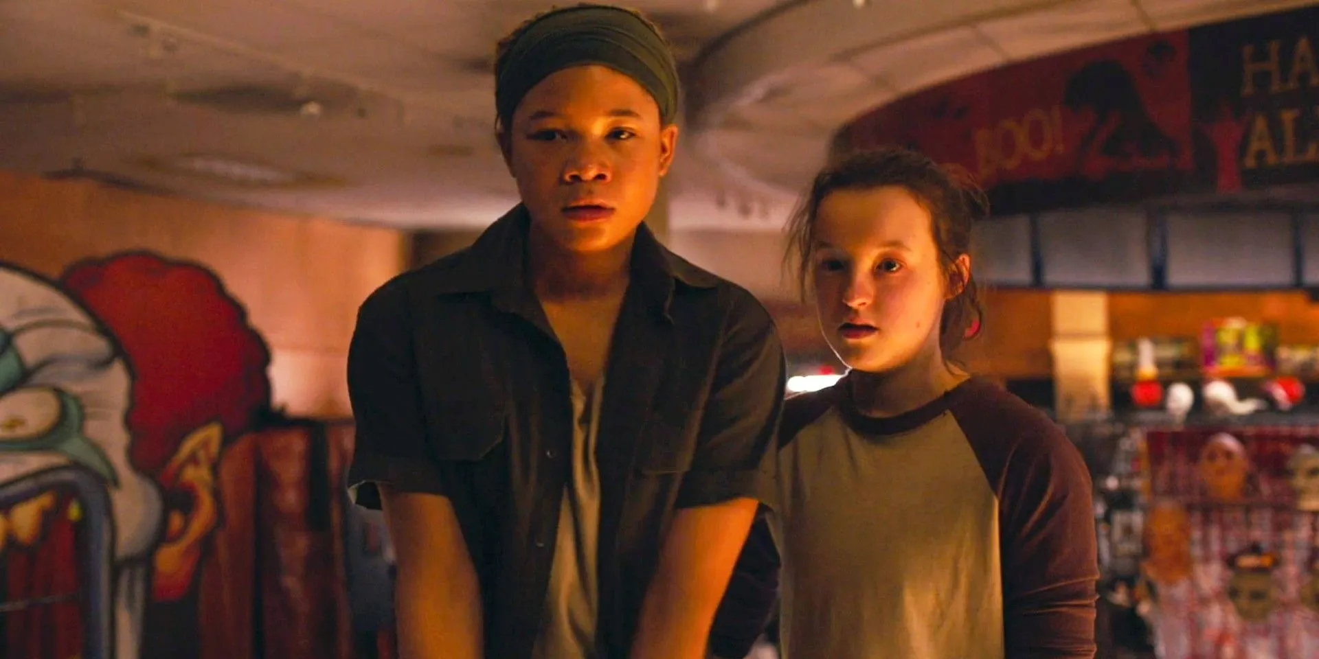 Ellie and Riley looking scared in The Last of Us Ellie and Riley looking scared in The Last of Us