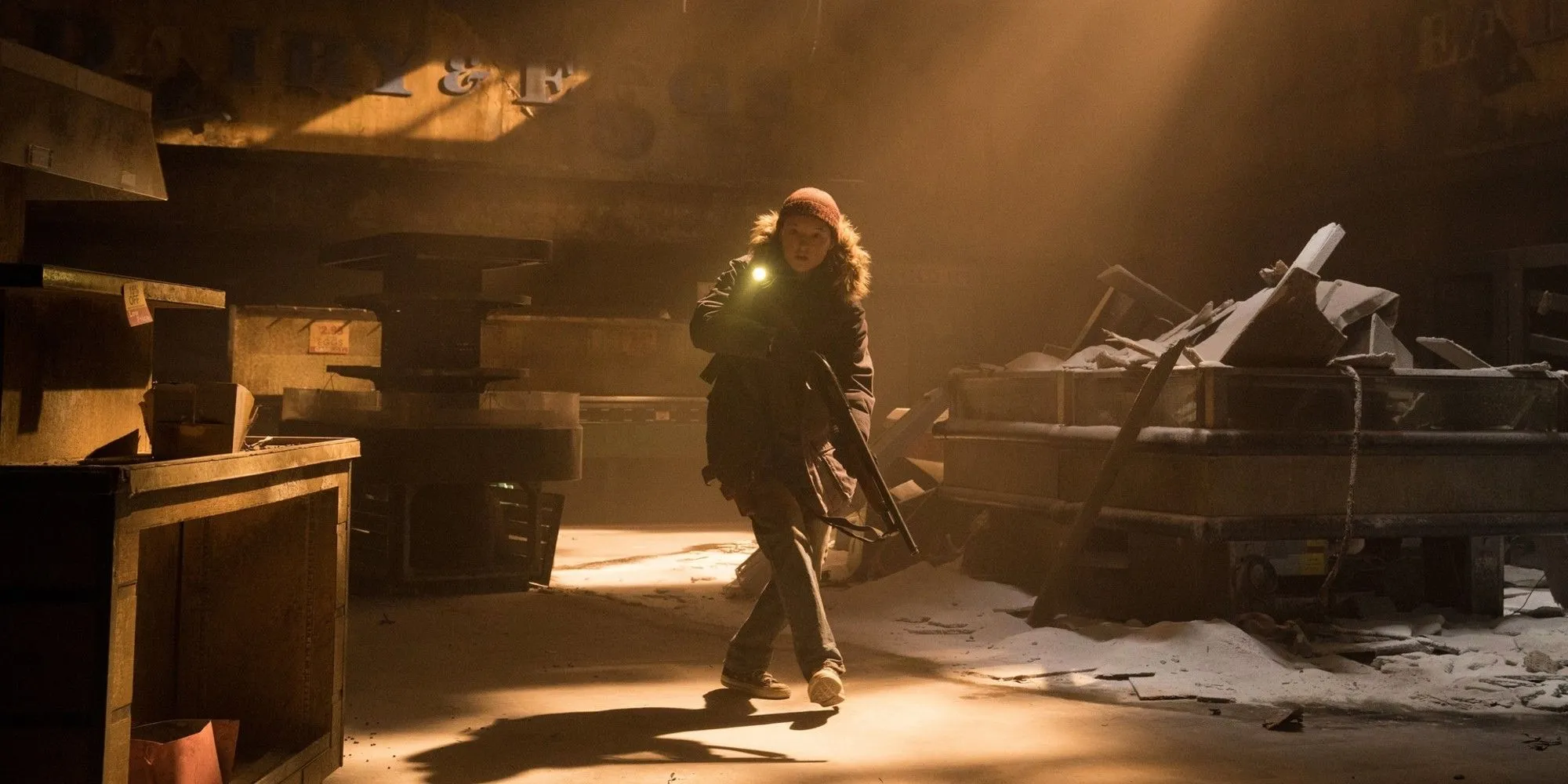 Ellie exploring an abandoned structure in The Last of Us Season 2 Ellie exploring an abandoned structure in The Last of Us Season 2