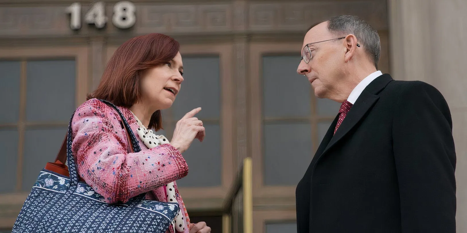 Carrie Preston as Elsbeth Tascioni and Michael Emerson as Judge Milton Crawford in Elsbeth