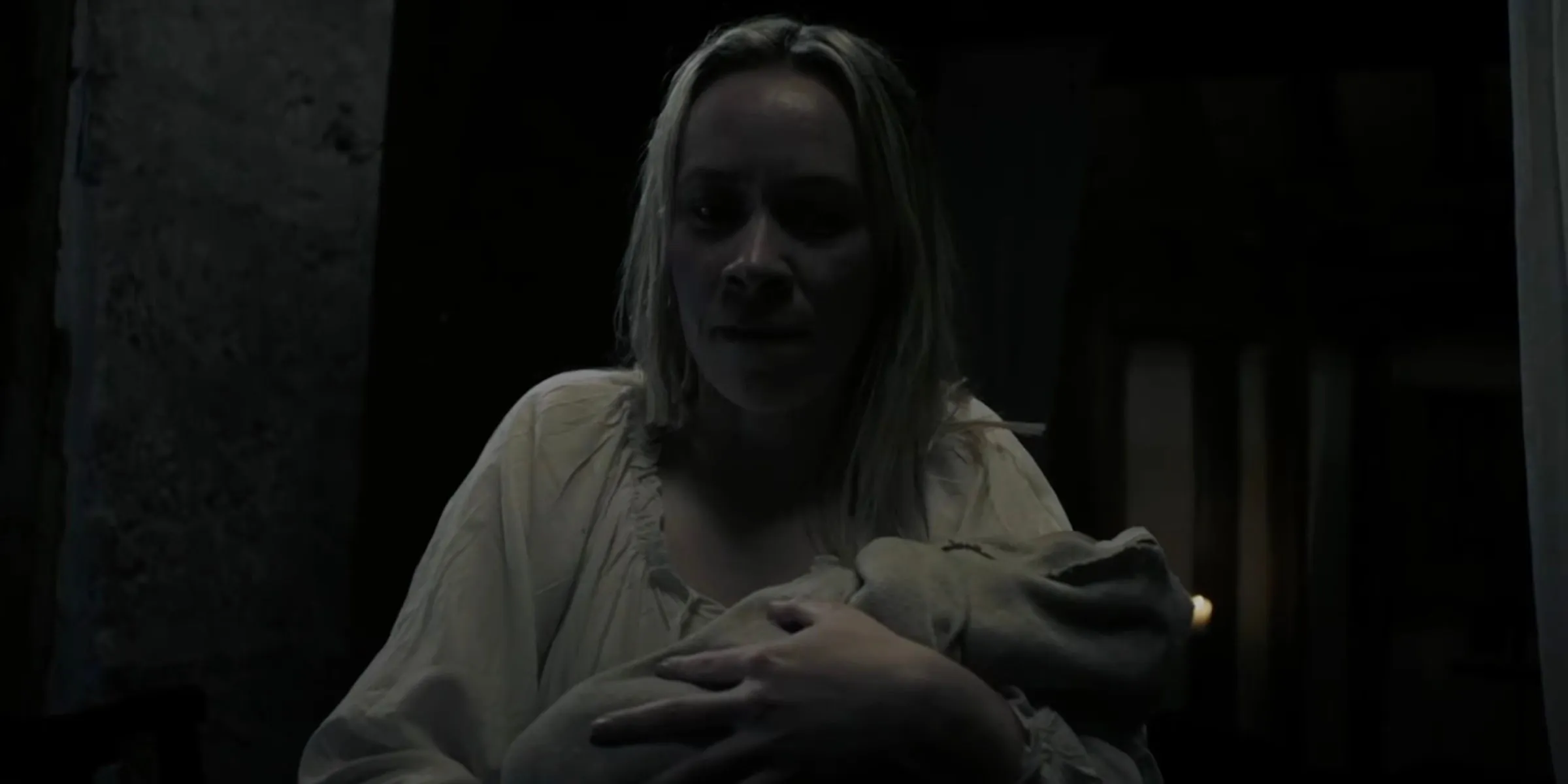 Evalina holding baby in Rumpelstiltskin Evalina holding baby in Rumpelstiltskin