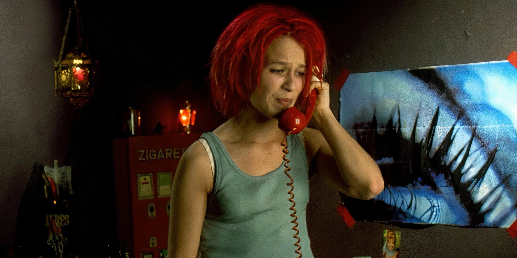 Franka Potente looks panicked as she holds a phone up to her ear. Franka Potente looks panicked as she holds a phone up to her ear.