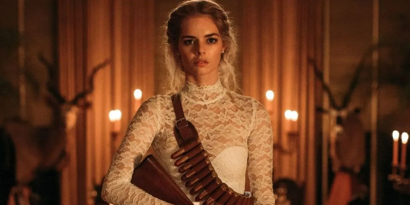 Grace (Samara Weaving) armed for the hunt in Ready or Not wearing her bridal dress Grace (Samara Weaving) armed for the hunt in Ready or Not wearing her bridal dress